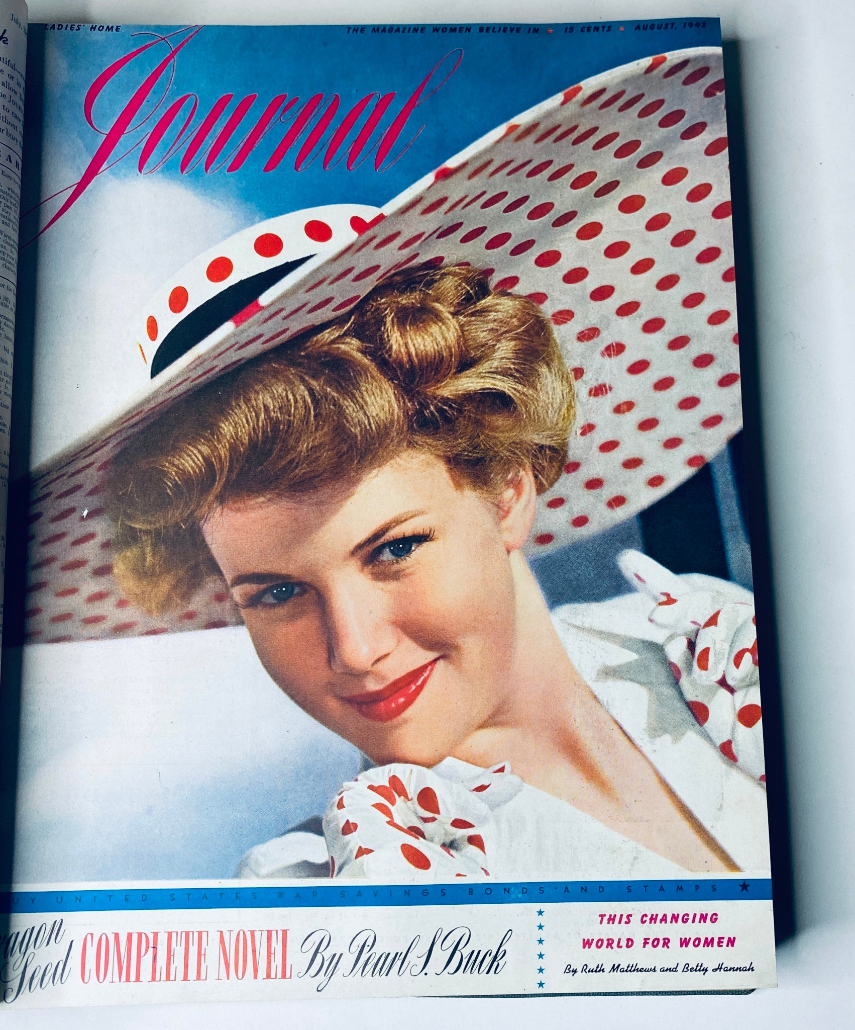 Cover of Ladies' Home Journal Library Bound Magazine 1942, showcasing a woman in a stylish hat with polka dots, exemplifying 1940s fashion trends.