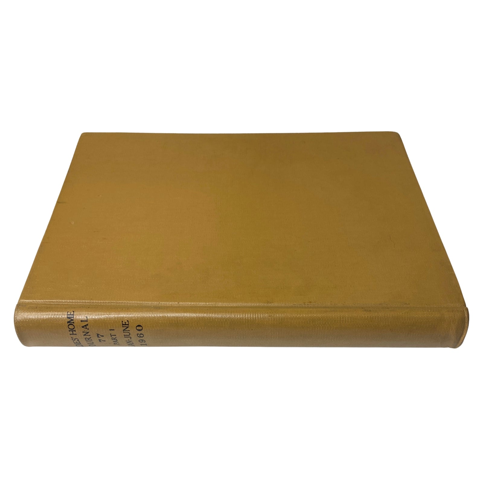 Side perspective of the Ladies' Home Journal Library Bound Magazine 1960, showcasing the sleek solid gold exterior, indicative of the magazine's classic appeal.