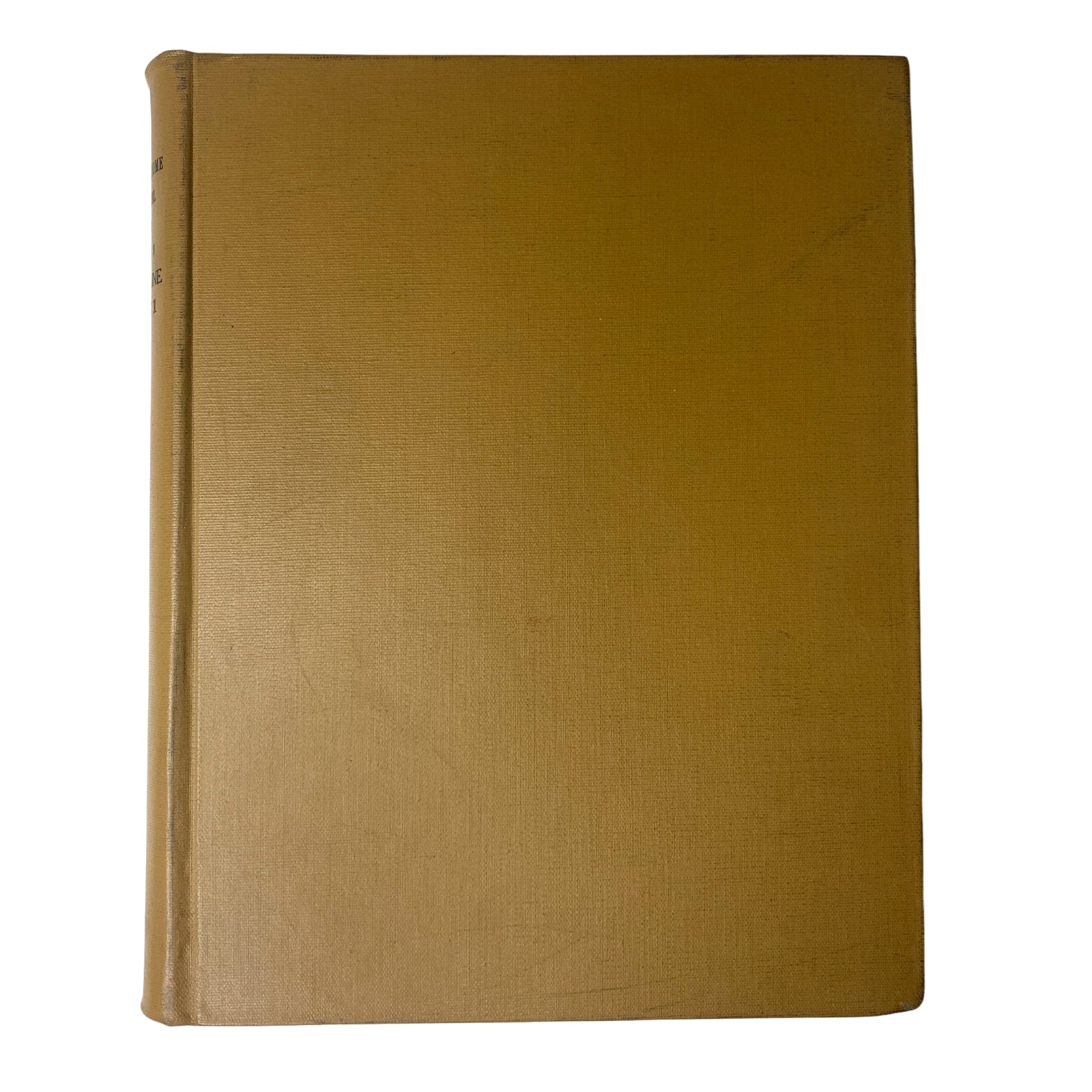 Side view of the Ladies' Home Journal library bound magazine for 1961, displaying the golden spine with no visible text, emphasizing the classic appearance.