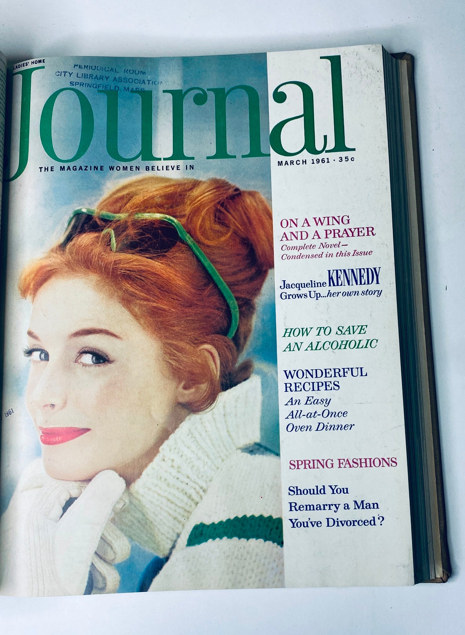 Cover of Ladies' Home Journal Bound Magazine 1961 presenting a woman with red hair and stylish outfit, highlighting topics like spring fashion in the March issue.