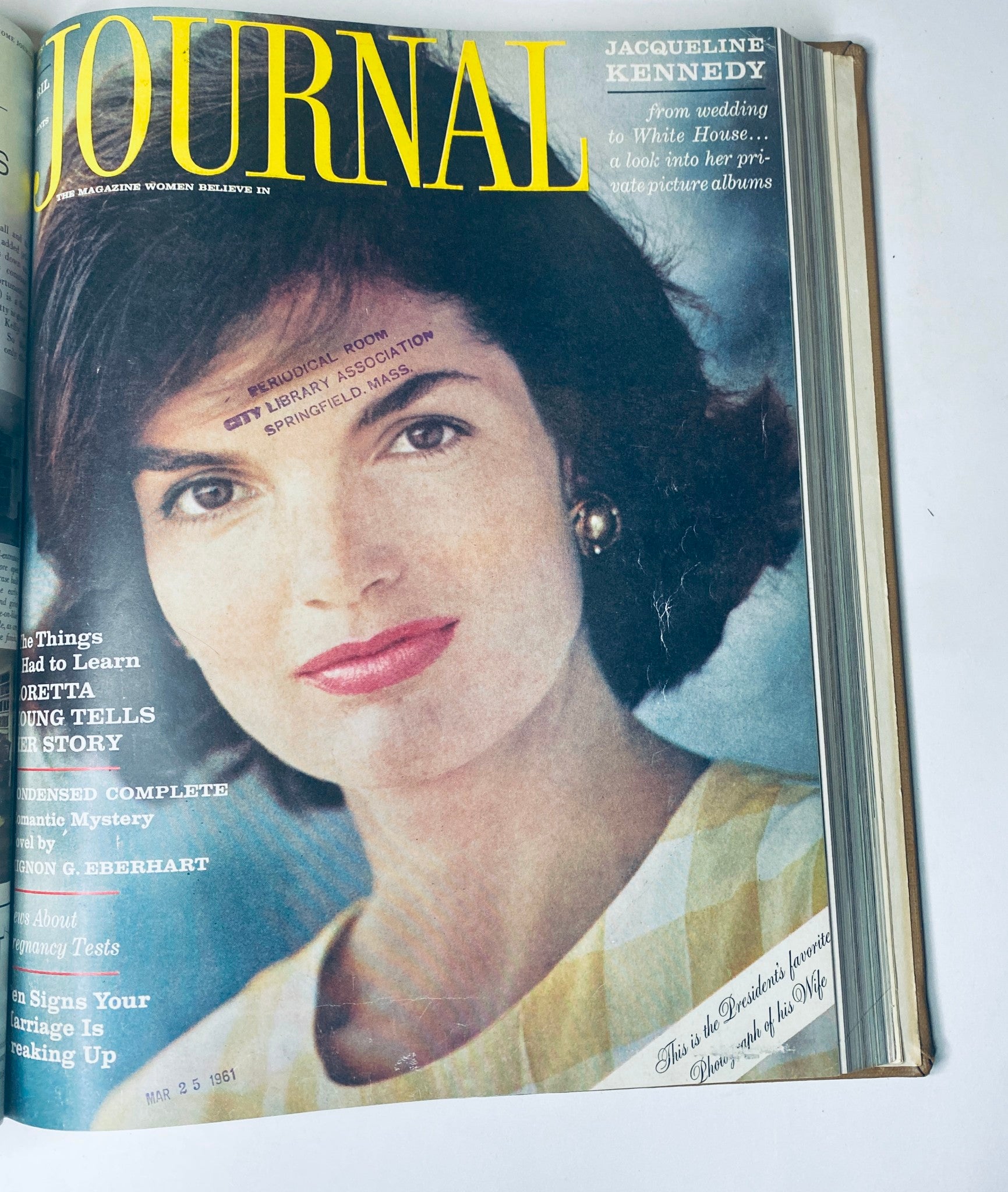 Cover of Ladies' Home Journal Bound Magazine 1961 with an elegant woman in classic attire, spotlighting Jacqueline Kennedy, featured in the March 15 issue.