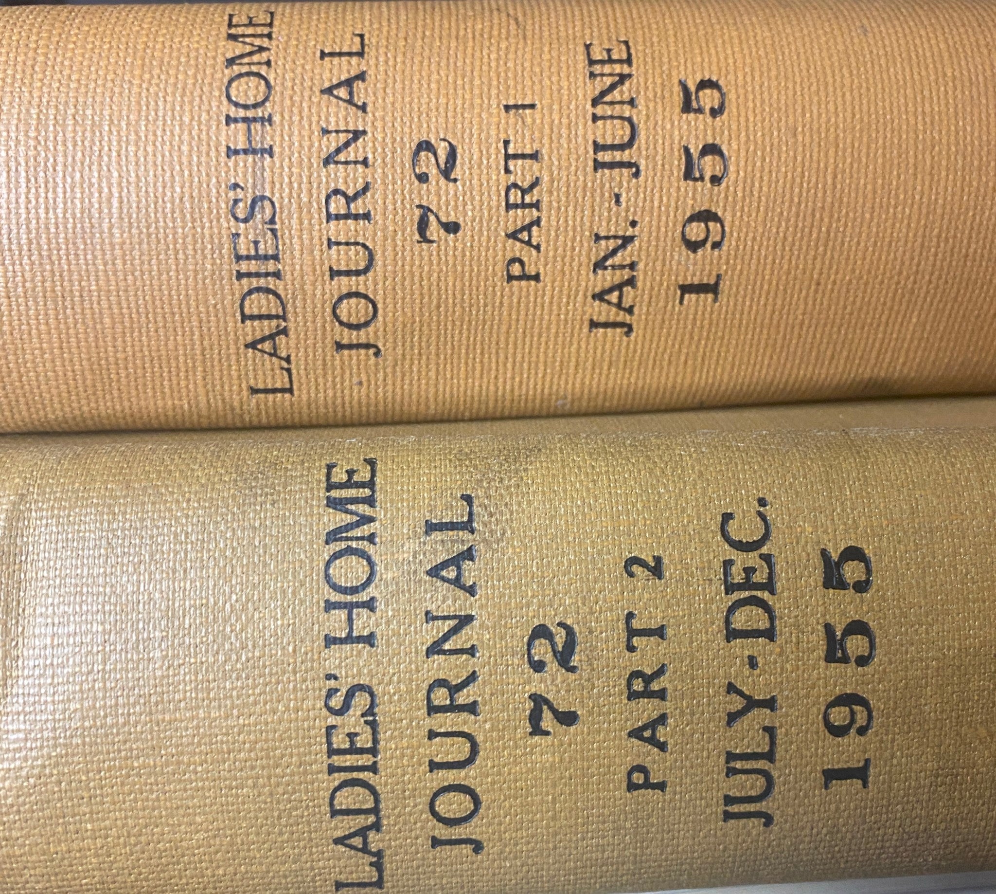 Ladies' Home Journal Bound Magazine 1955 Full Year January - December, highlighting the spines of two volumes labeled with publication months.
