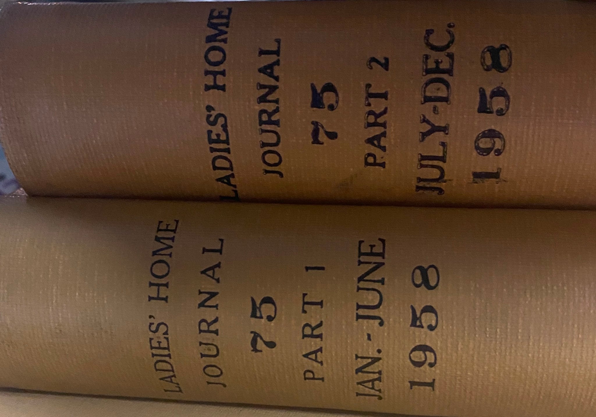 Spines of two bound volumes of Ladies' Home Journal, featuring the year 1958 with January to June and July to December issues.