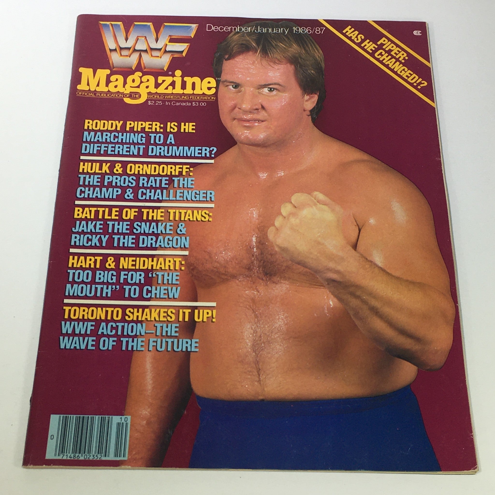 Cover of the VTG WWF Magazine December January 1986-1987, featuring Roddy Piper, Hulk Hogan, and Paul Orndorff with articles highlighted on wrestling history.
