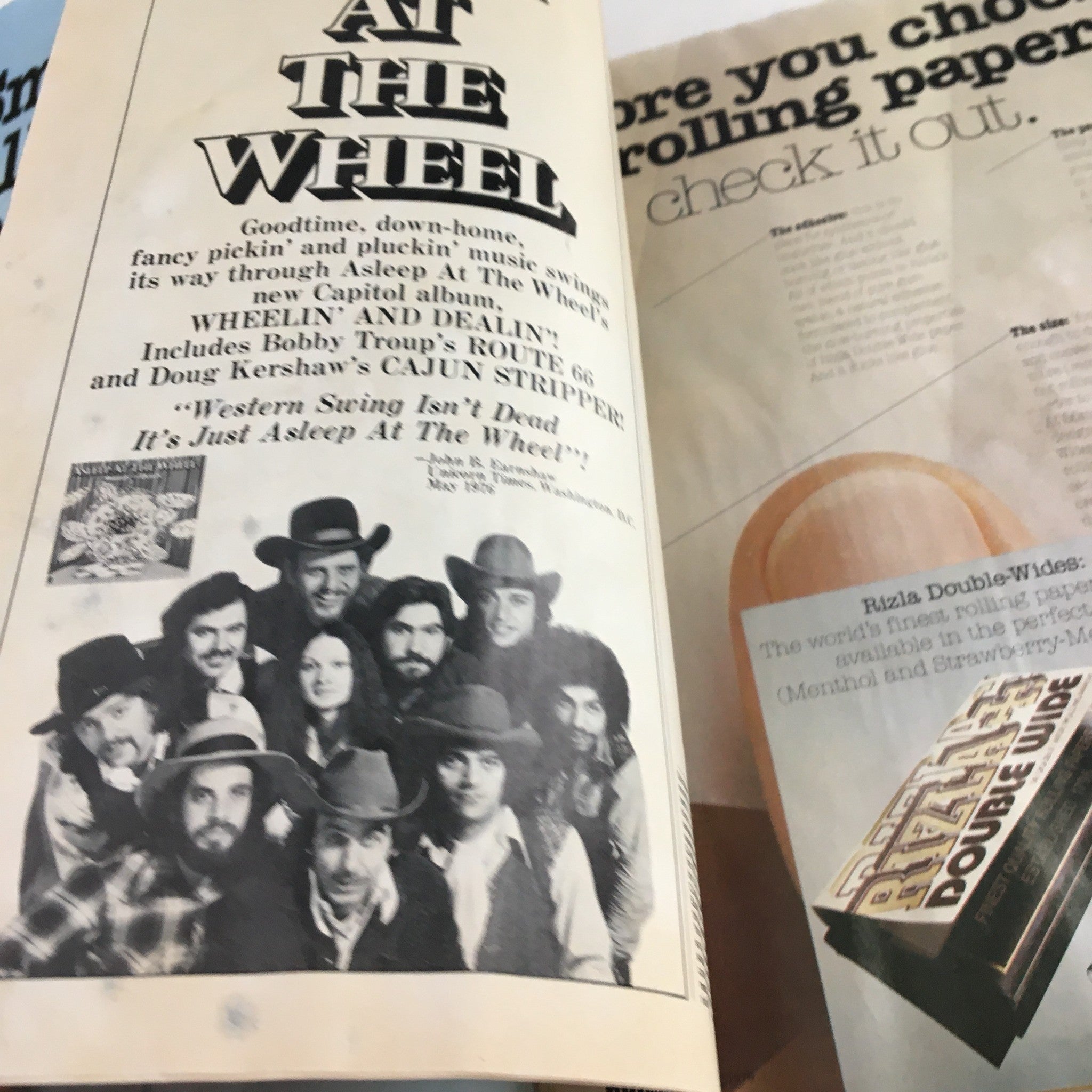 Interior page of High Times Magazine October 1976 featuring a vintage advertisement for Rizla rolling papers with a group of musicians, emphasizing rolling paper options in cannabis culture.