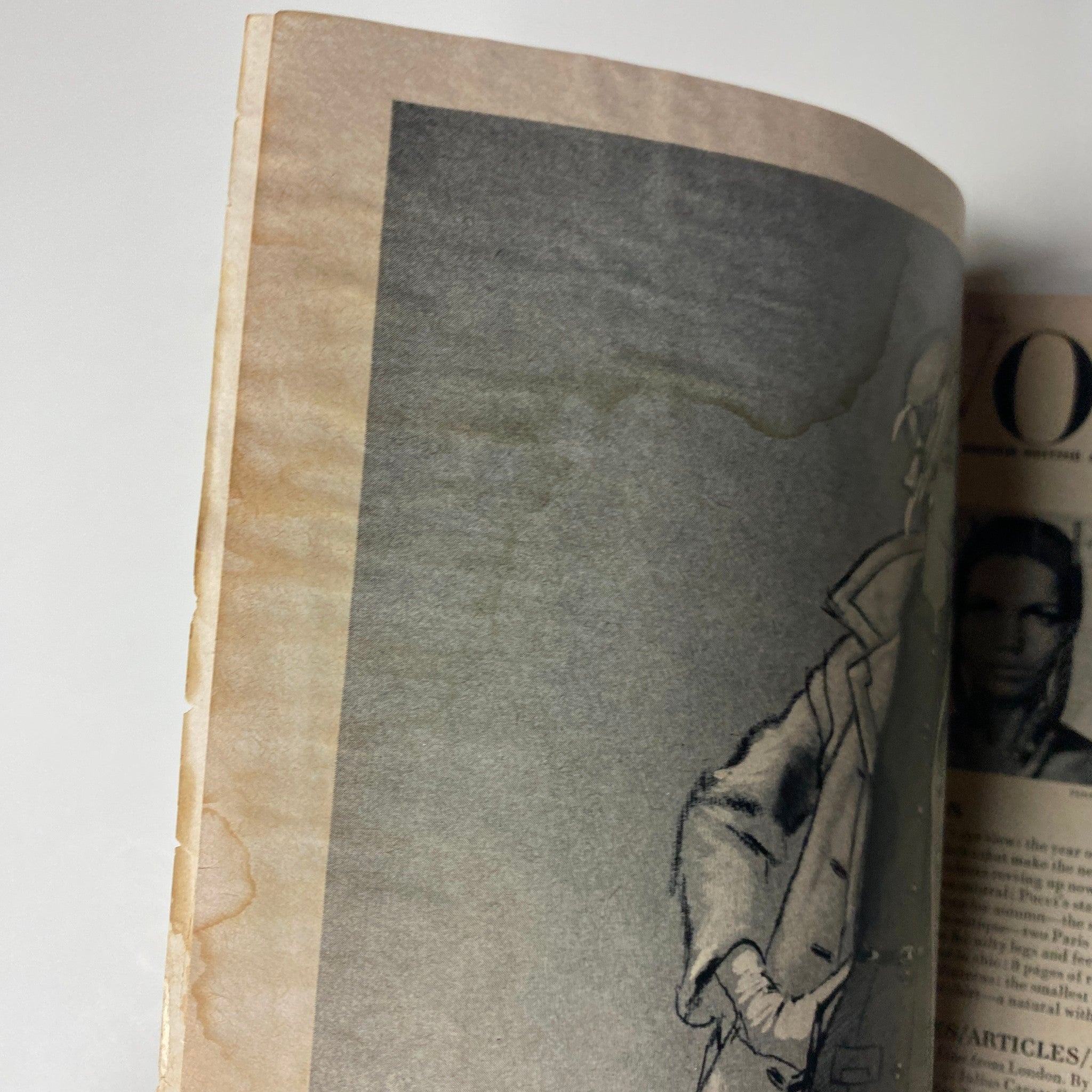 Detail of an illustration from Vogue Magazine August 15, 1965, showing a faded graphic design related to contemporary fashion.