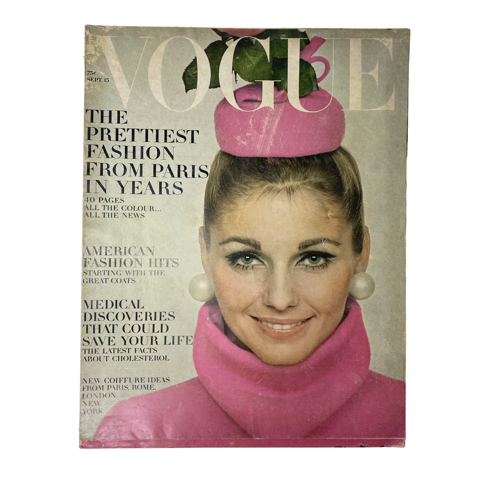 Cover of Vogue Magazine dated September 15, 1967 featuring model Heidi Weideck, known for her stylish high pouf hairstyle and pink outfit, photographed by Richard Avedon. This edition highlights 'The Prettiest Fashion from Paris in Years' and includes insights on fashion trends, beauty, and cultural articles from the era.