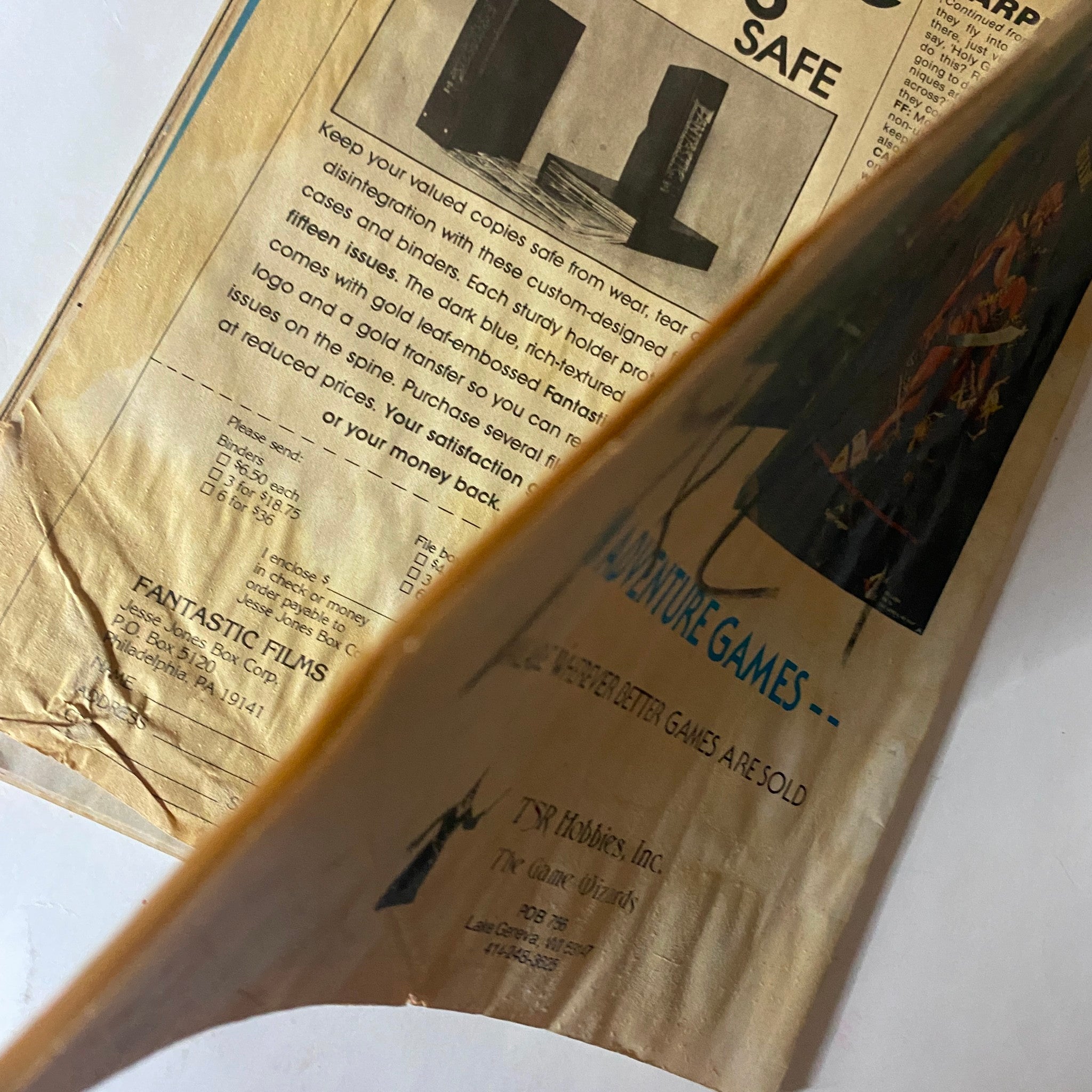 Side view of the VTG Fantastics Films Magazine July 1980 displaying pages and an advertisement for protective cases for magazines.