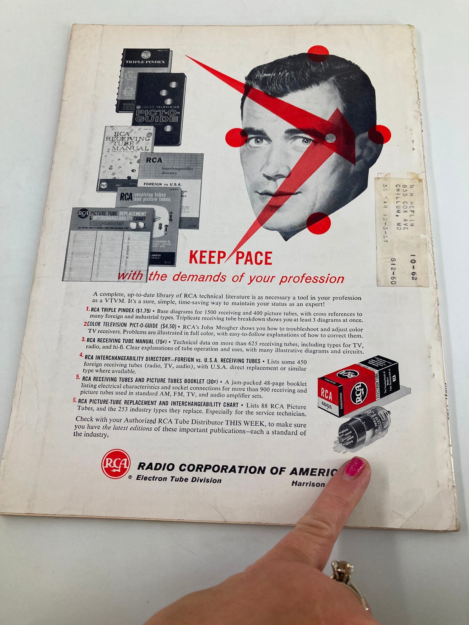 Back cover of VTG Electronic Technician Magazine May 1960 featuring an advertisement from RCA, with a graphic of a man and various technical literature related to electronics.