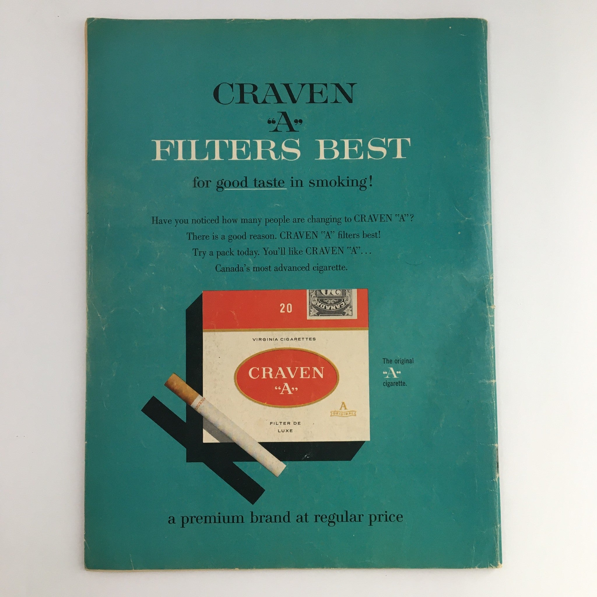 Back cover of a vintage advertisement for Craven 'A' Filters Best cigarettes, highlighting 20 pack design against a teal background.