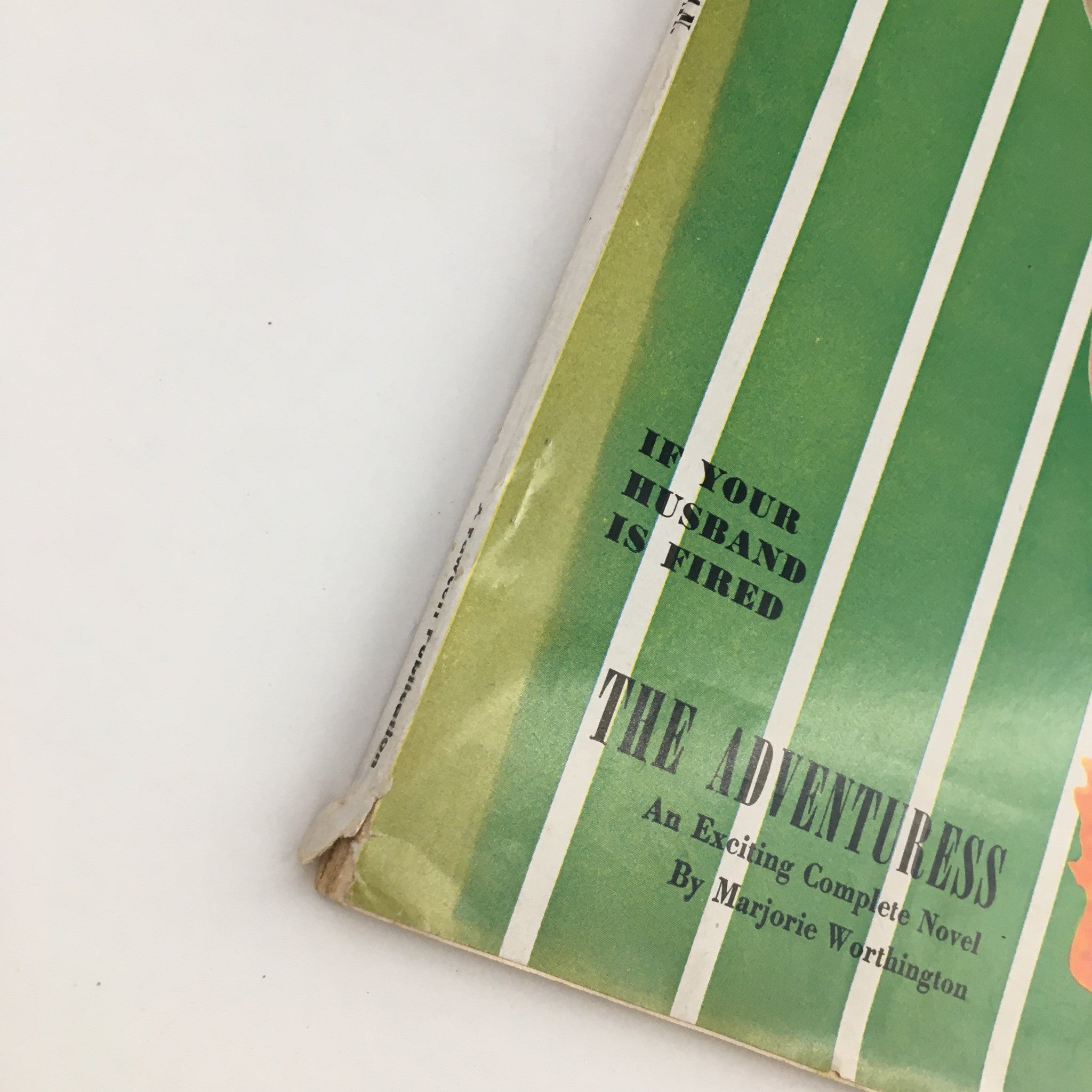 Side detail of Today's Woman Magazine March 1950, featuring text about a novel titled 'The Adventuress' with a vintage design.