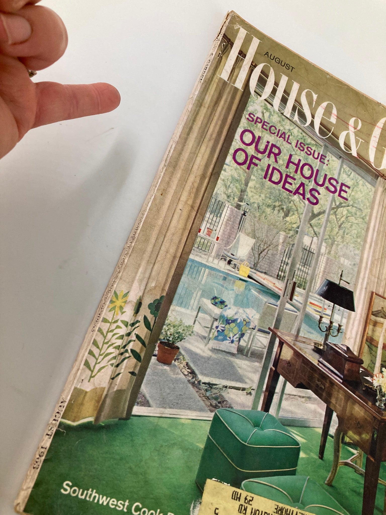 Close-up of the VTG House & Garden Magazine August 1963 cover showing the title and details of the living room scene with a pool, emphasizing mid-century design aesthetics.