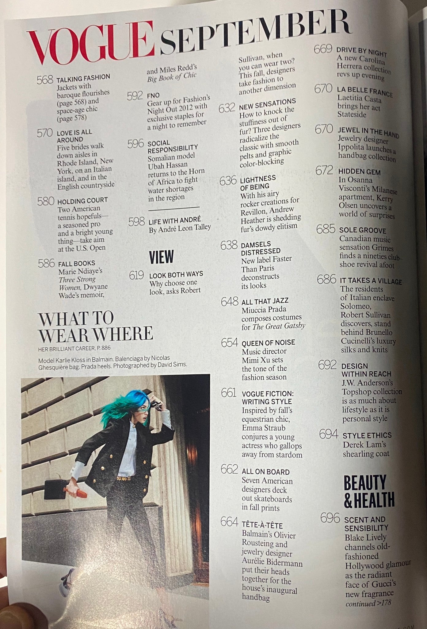 What to Wear Where section from Vogue Magazine September 2012 featuring model Karlie Kloss styled with vibrant blue hair, showcasing the season's fashion trends.