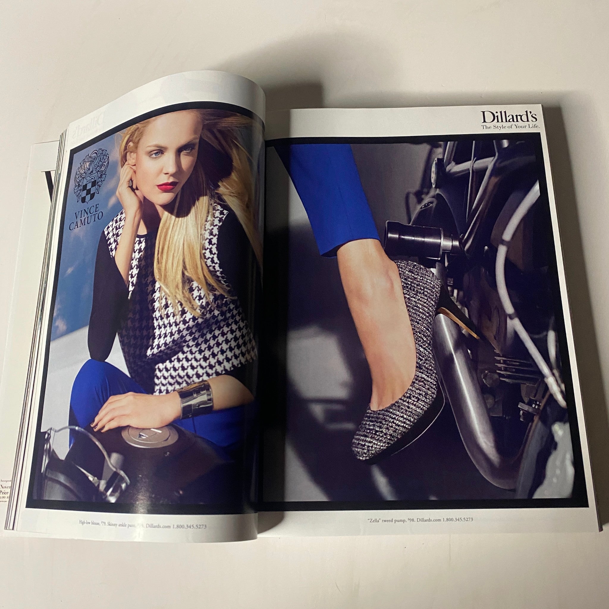 Fashion advertisement featured in Vogue Magazine September 2012 from Dillard's showcasing a stylish model's foot wearing a sleek shoe against a dynamic backdrop.