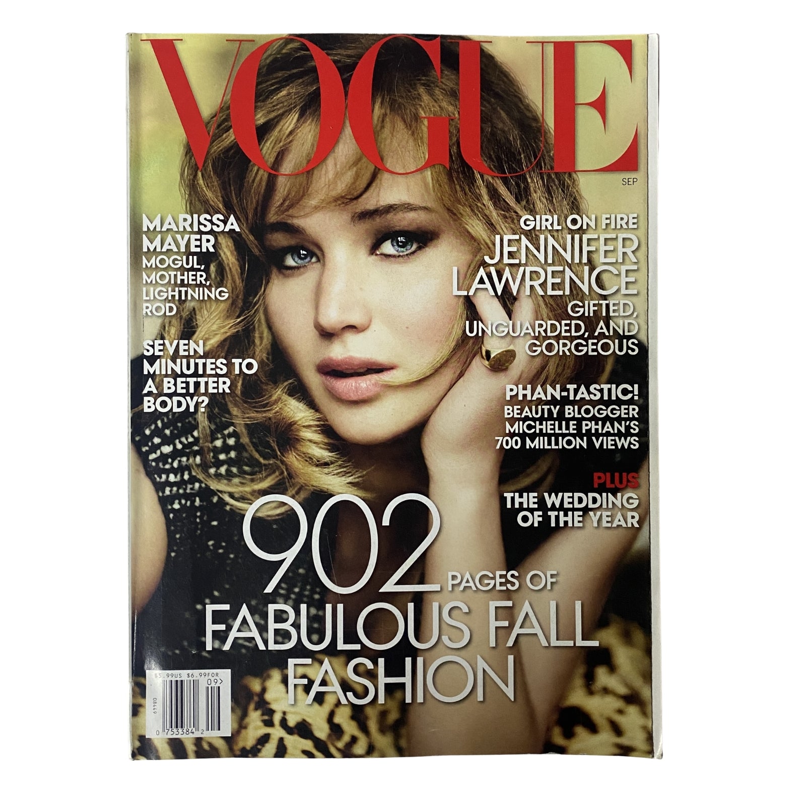 Vogue Magazine September 2013 cover featuring Jennifer Lawrence with the text '902 Pages of Fabulous Fall Fashion' and additional headlines including 'Girl on Fire', 'Unguarded, and Gorgeous'.