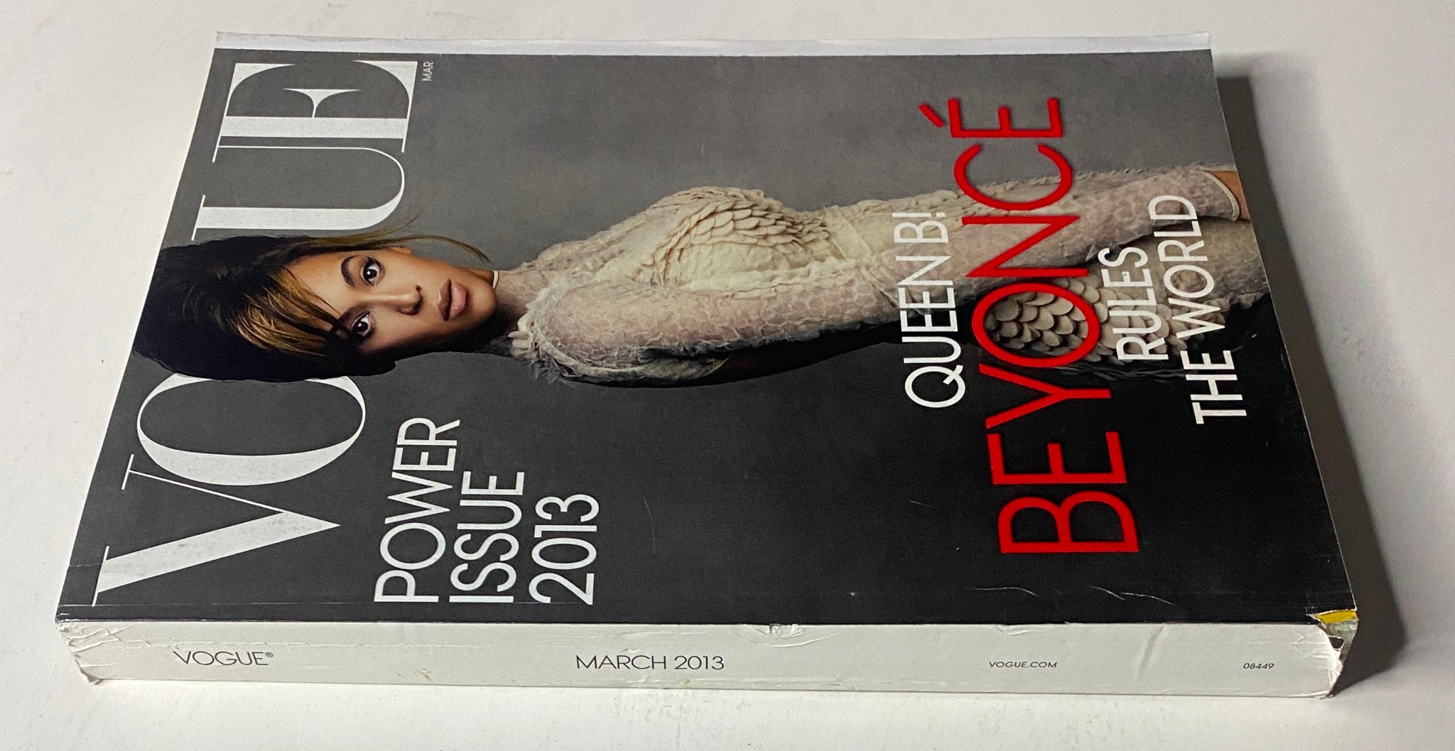 Vogue Magazine March 2013 Beyoncé Knowles Cover showcasing 'Queen B: Beyoncé Rules the World' with a striking image of the singer in a high-fashion couture outfit.