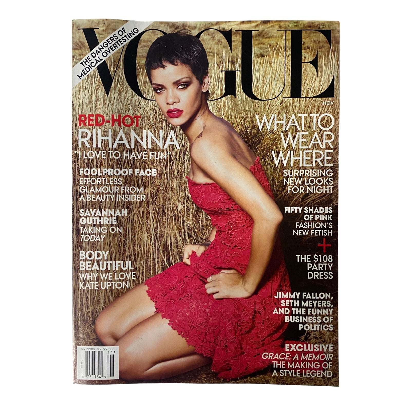 Vogue Magazine November 2012 cover featuring Rihanna in a red strapless dress on a hay background, showcasing fashion highlights and cultural themes.