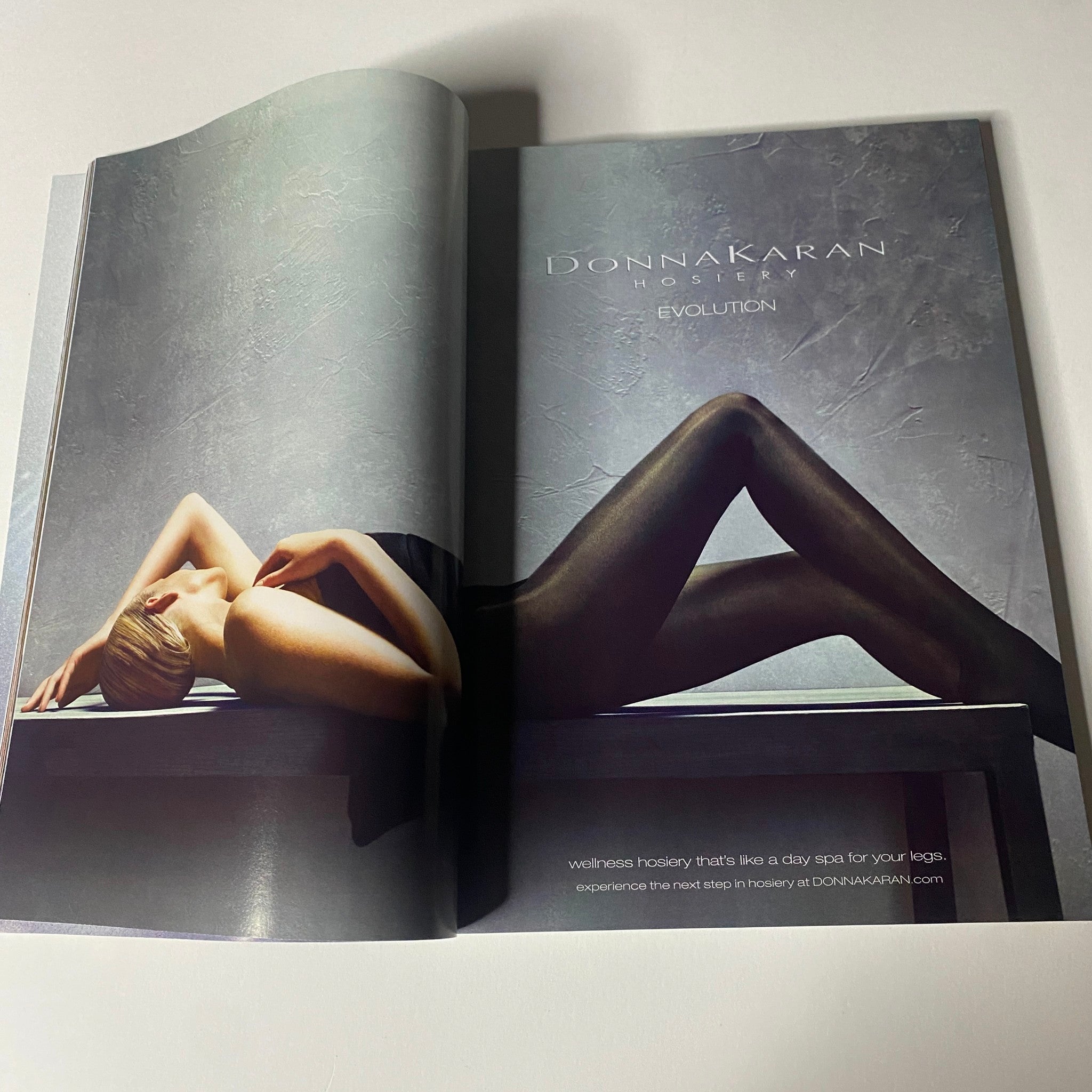 Vogue Magazine October 2012 showcasing an advertisement for Donna Karan hosiery, emphasizing luxury and elegance in fashion.