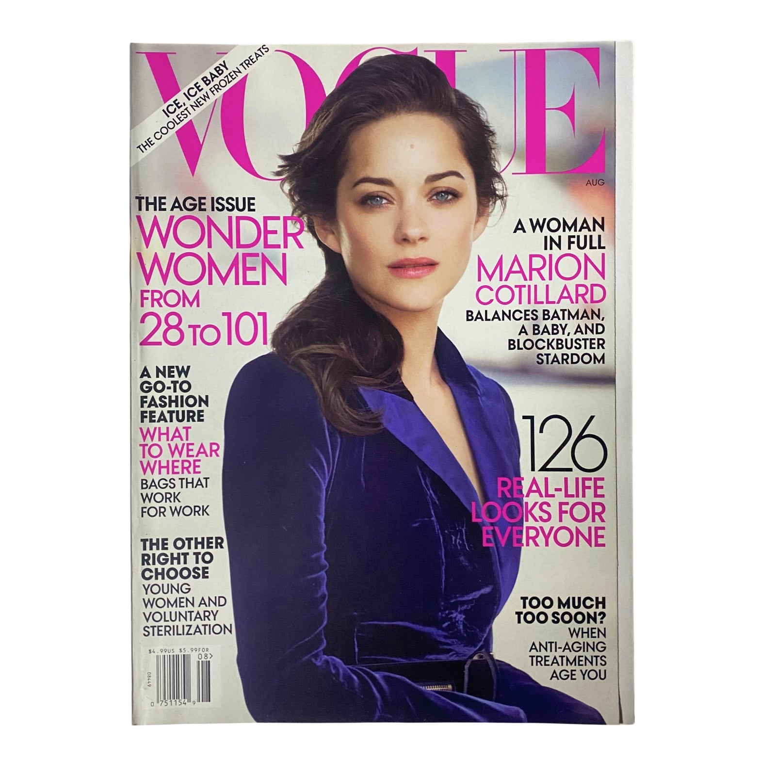 Vogue Magazine August 2012 cover featuring Marion Cotillard, showcasing her elegant style in a striking purple outfit.