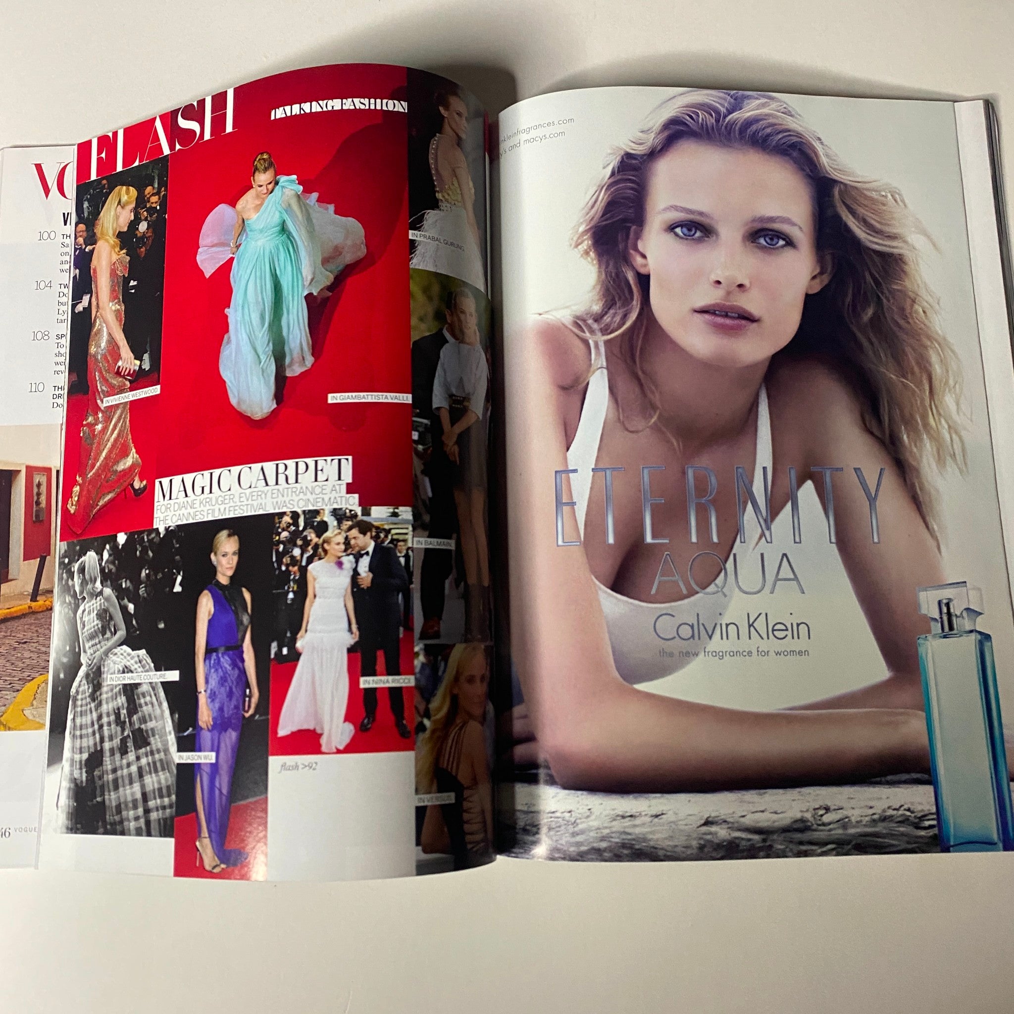 Inside Vogue Magazine August 2012 featuring fashion editorial spreads, including stunning dresses and Calvin Klein perfume advertisement, highlighting Marion Cotillard's cover engagement.