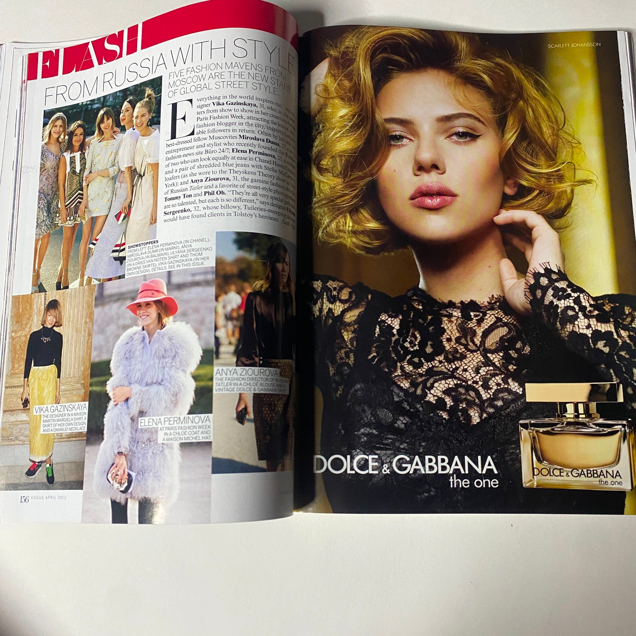 Vogue Magazine April 2012 page showcasing fashion photography with featured items from Dolce & Gabbana and editorial content related to global street style.