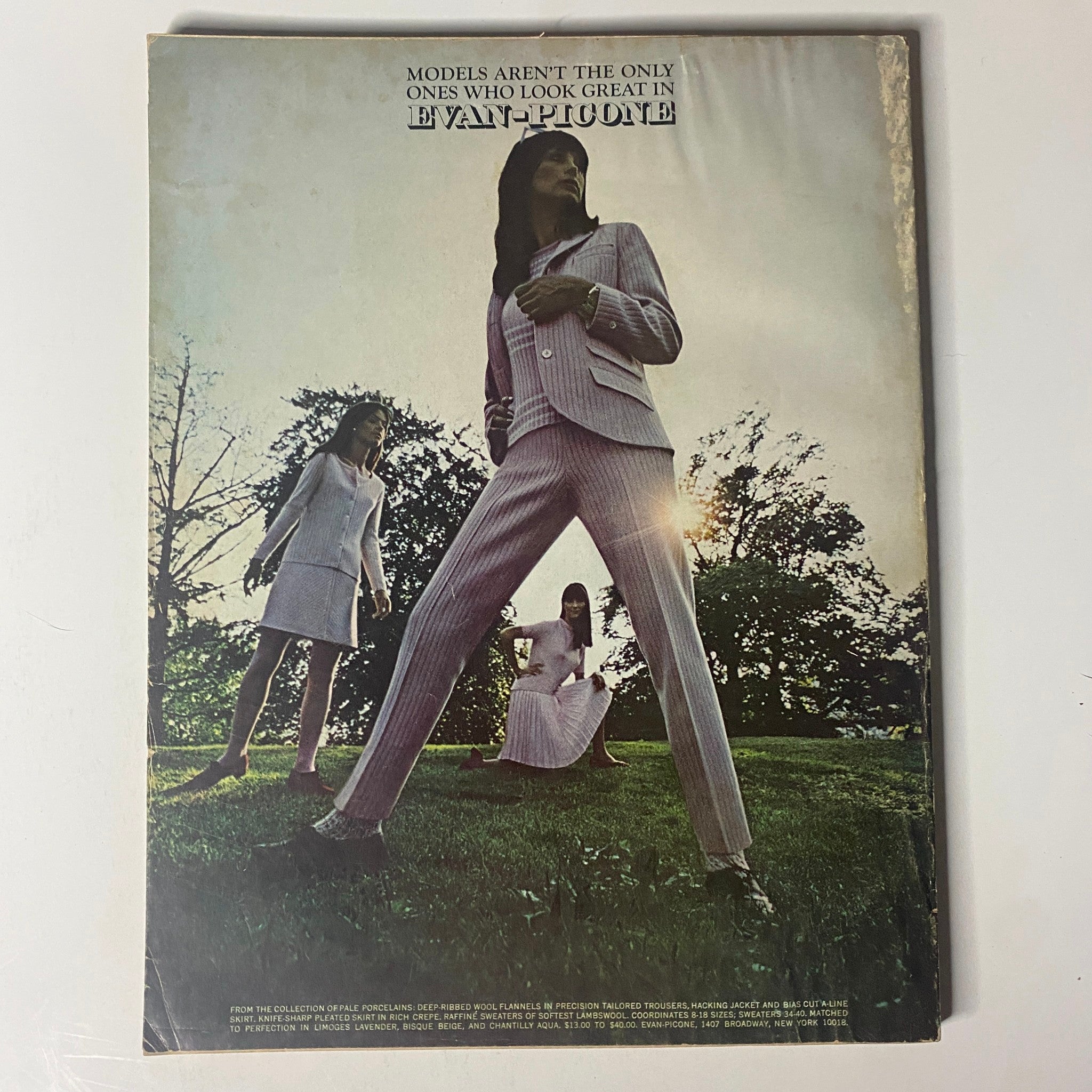 Back cover of Vogue Magazine November 1, 1966, with striking photography and a fashion statement advertisement, capturing the essence of the era.