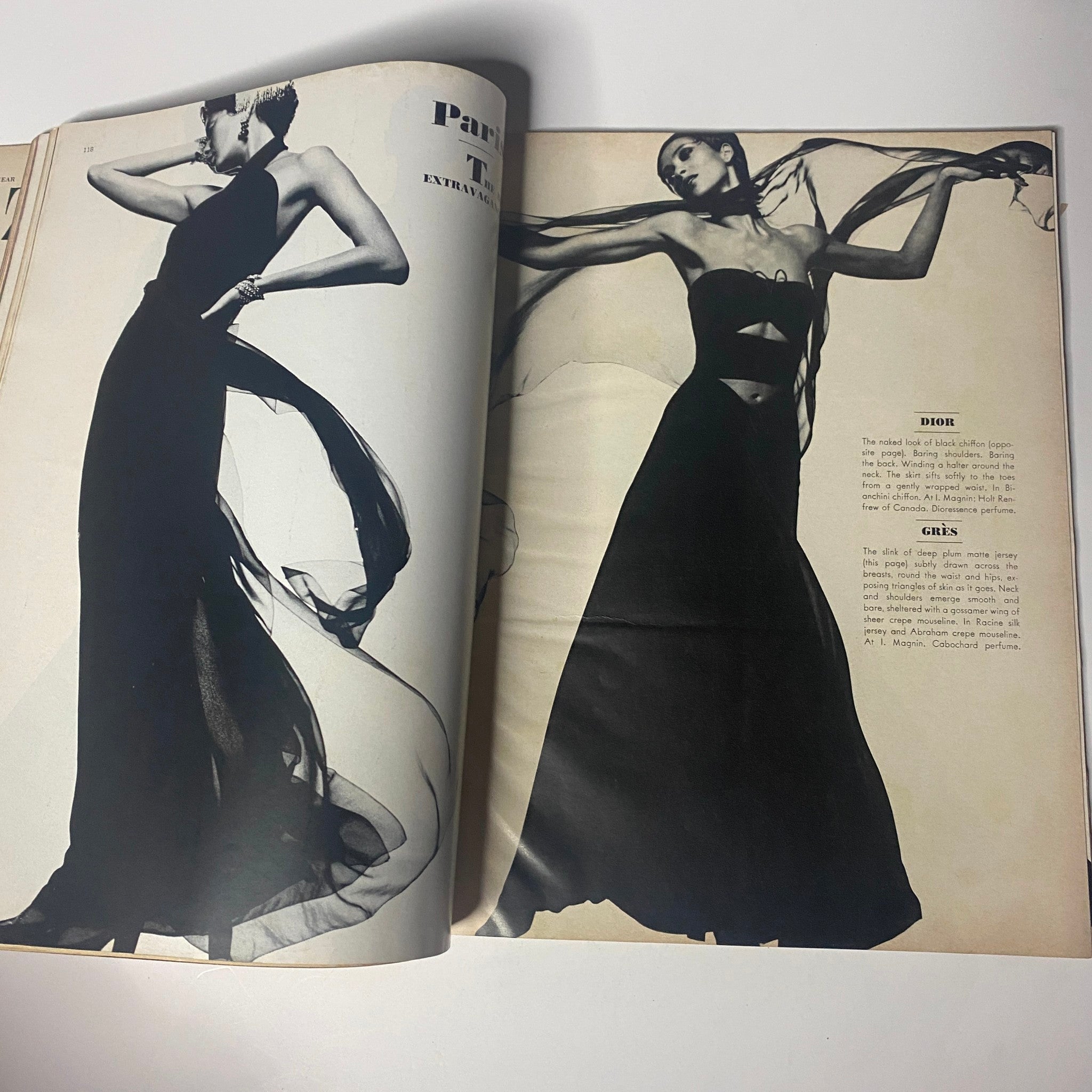 A fashion spread from Harper's Bazaar Magazine October 1971 showcasing elegant Dior designs on models, illustrating the magazine's focus on high fashion.