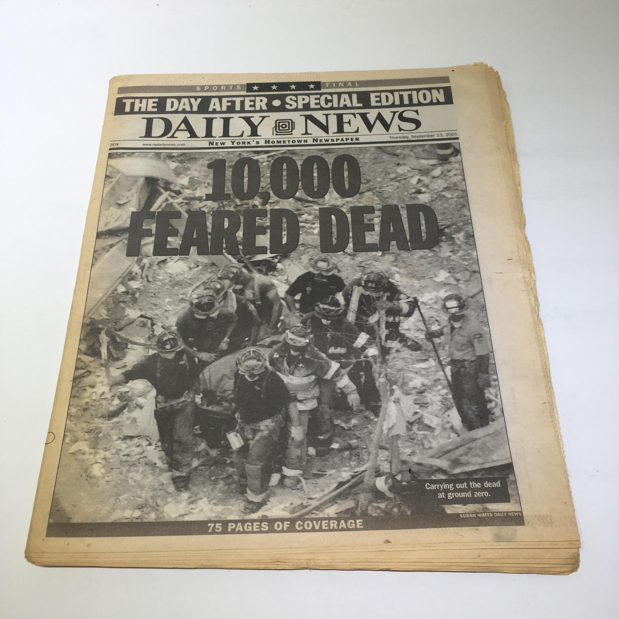 NY Daily News:9/13/2001, 10000 Feared Dead, Carrying Out the Dead at Ground Zero