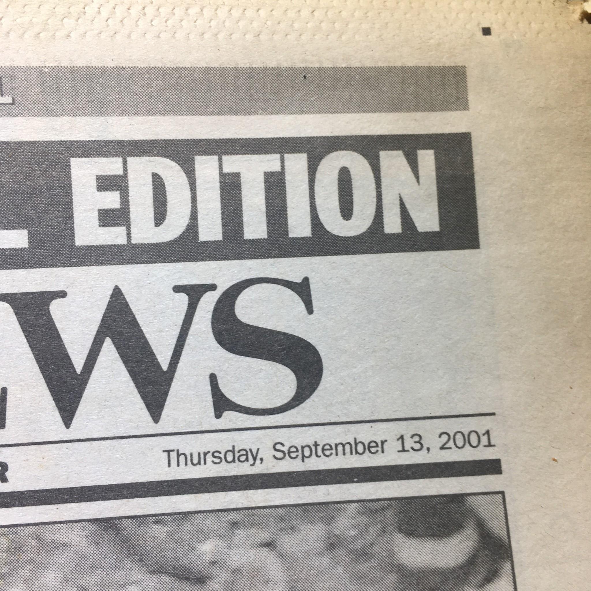 NY Daily News:9/13/2001, 10000 Feared Dead, Carrying Out the Dead at Ground Zero