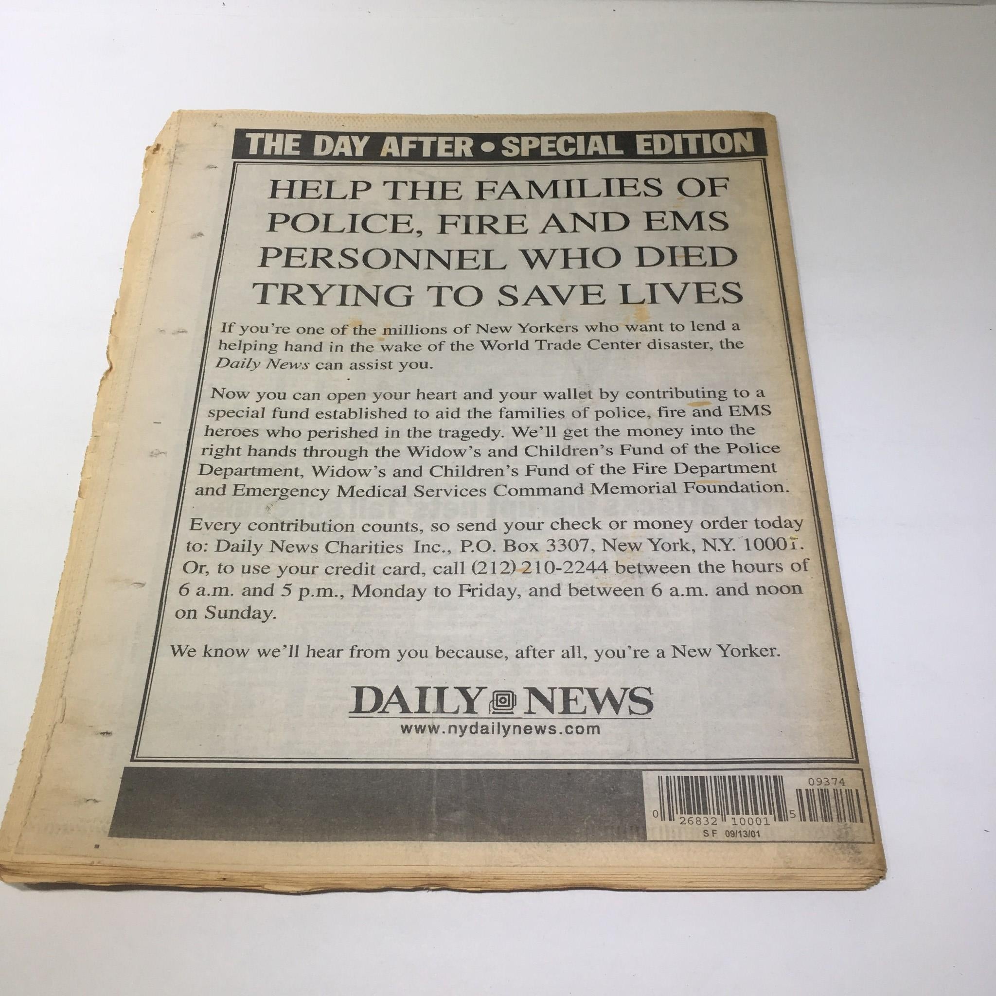 NY Daily News:9/13/2001, 10000 Feared Dead, Carrying Out the Dead at Ground Zero