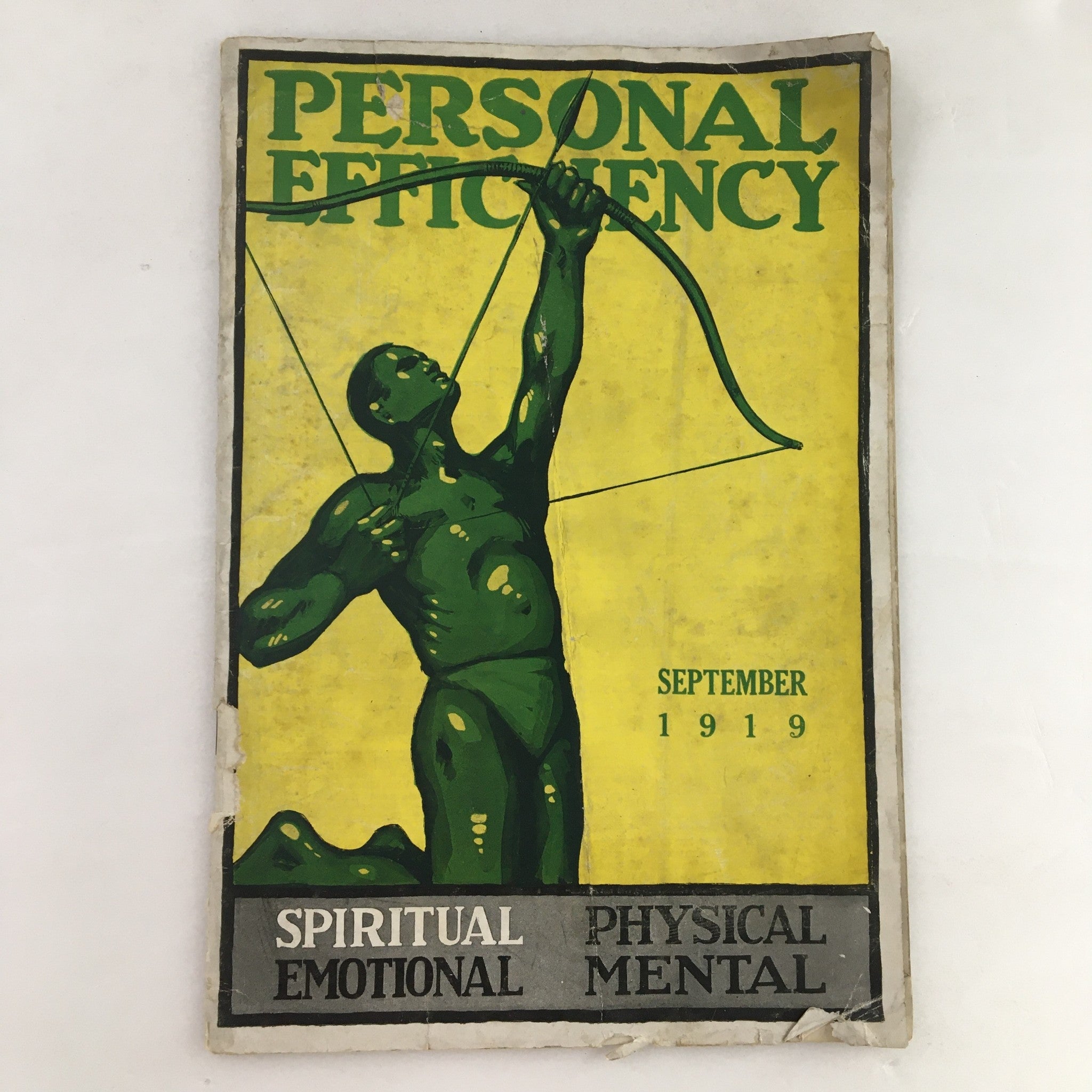 Cover of Personal Efficiency Magazine September 1919 featuring a green figure drawing a bow, highlighting themes of spiritual, emotional, physical, and mental improvement.