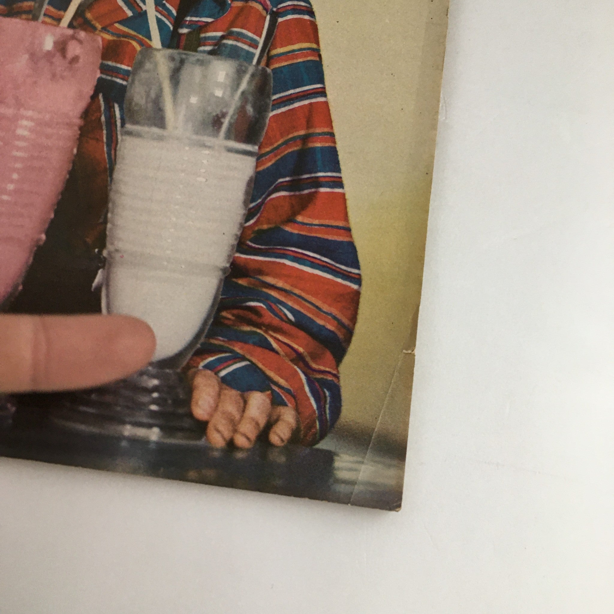 Close-up of the Family Circle Magazine August 1949 cover highlighting a young boy holding a milkshake glass, portraying nostalgic childhood moments.