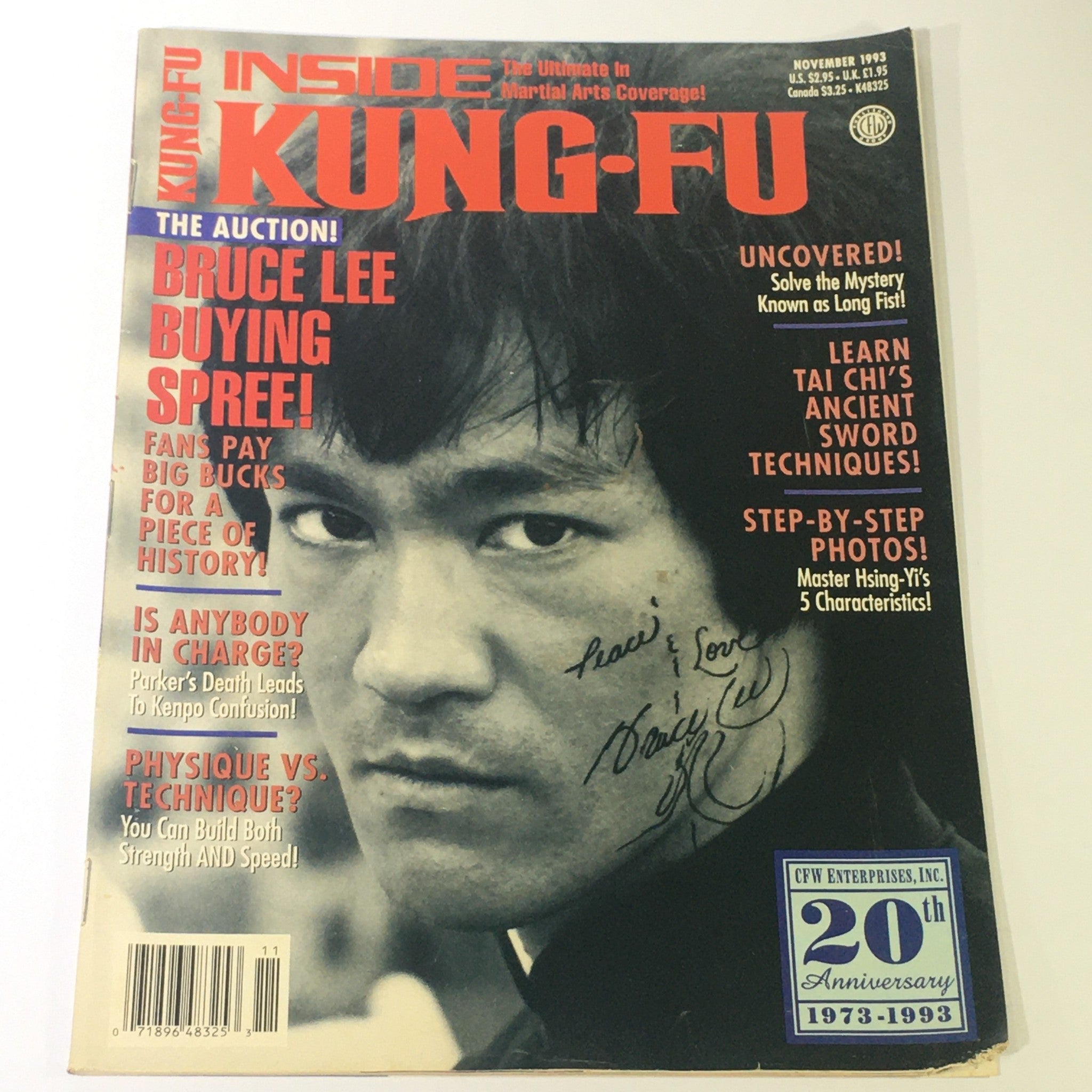 Cover of Inside Kung Fu Magazine November 1993 featuring Bruce Lee. The headline reads 'The Auction! Bruce Lee Buying Spree!' with additional articles on Hsing-Yi martial arts and techniques. The cover showcases a portrait of a young Bruce Lee, adding to its collectible value for martial arts enthusiasts.