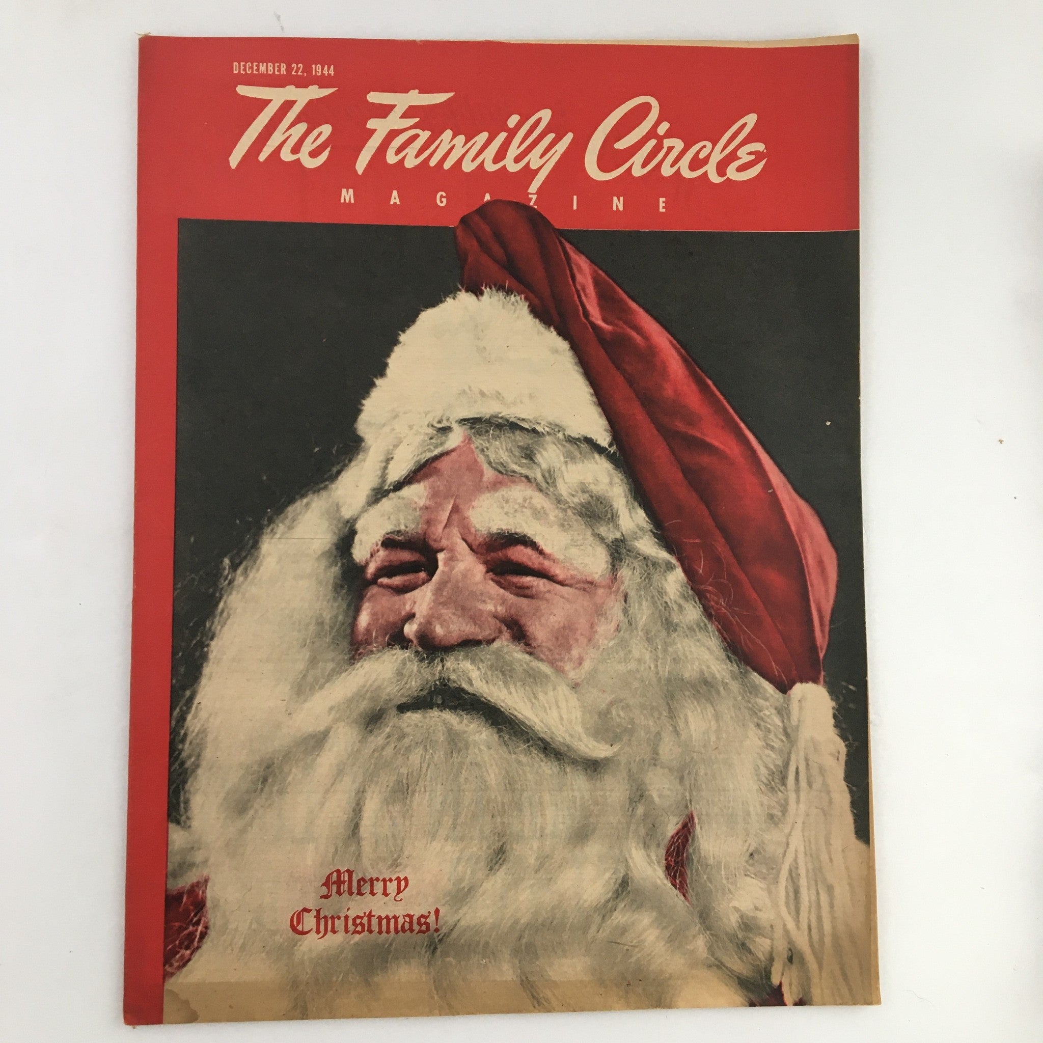 Cover of The Family Circle Magazine from December 22, 1944 featuring Santa Claus with a 'Merry Christmas!' greeting. Vintage magazine collectible showcasing holiday spirit.