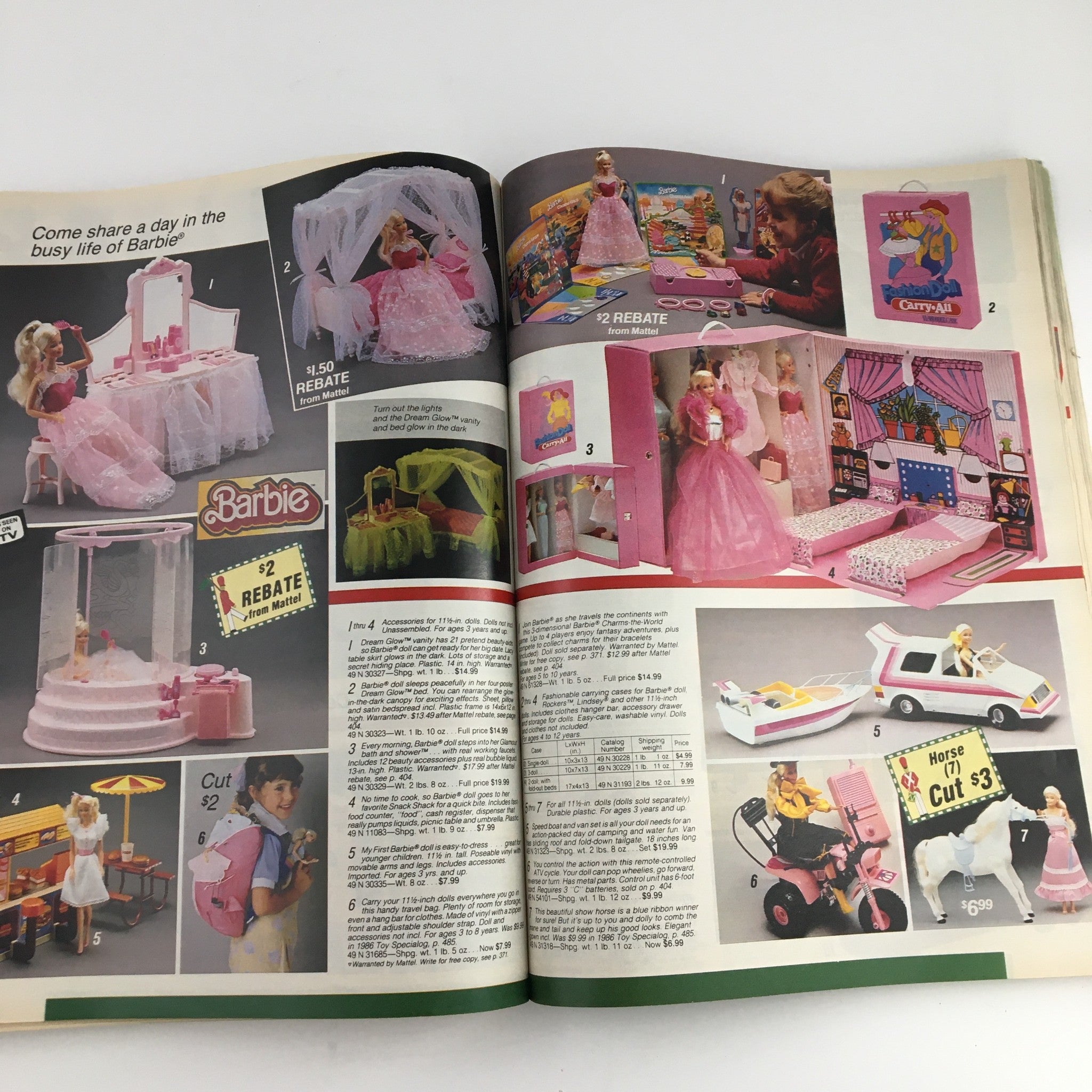 Page from the 1986 Sears Wish Book For Kids Barbie Toy Catalog showcasing Barbie playsets with accessories, including a pink castle and diner, inviting imaginative play.