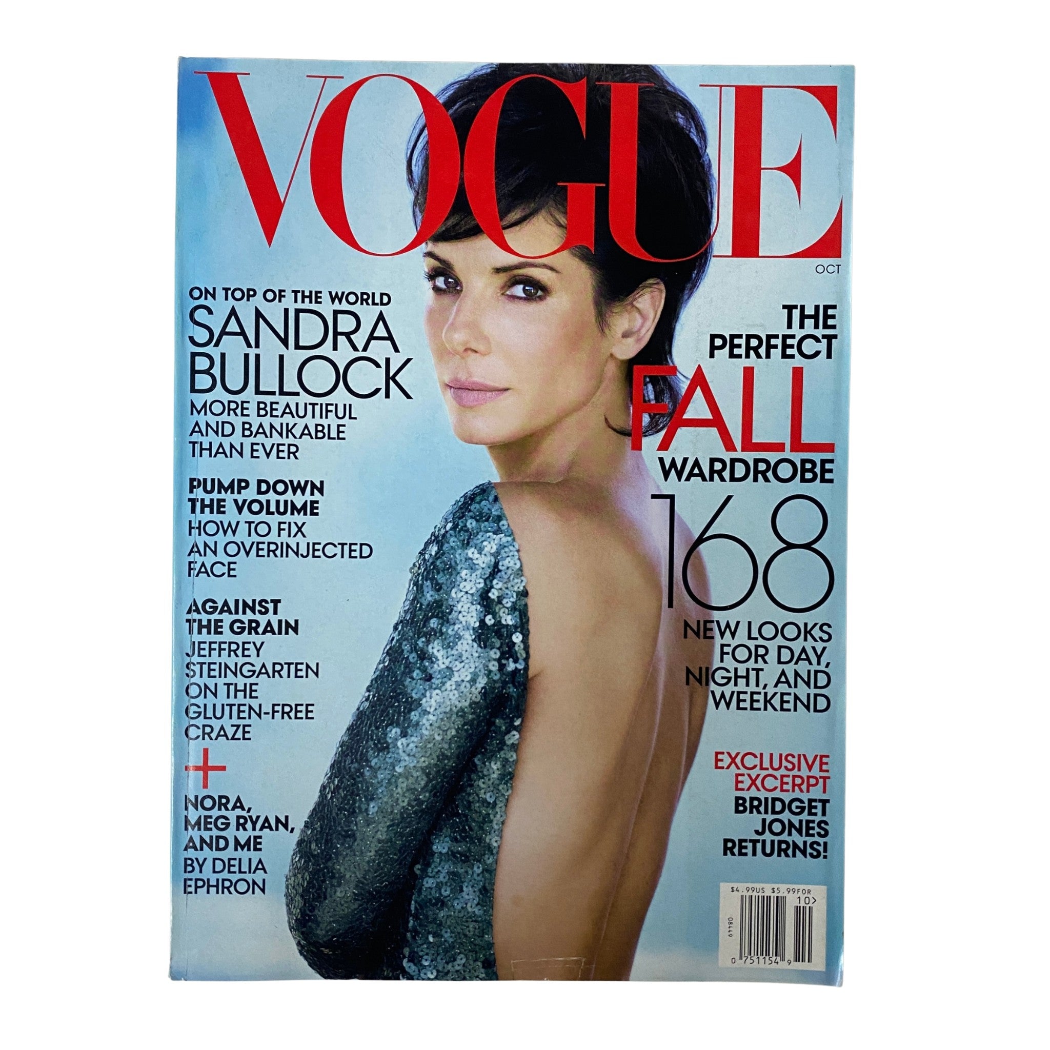 Vogue Magazine October 2013 featuring Sandra Bullock on the cover, showcasing the theme 'The Perfect Fall Wardrobe' with a focus on her glamorous outfit and editorial highlights.