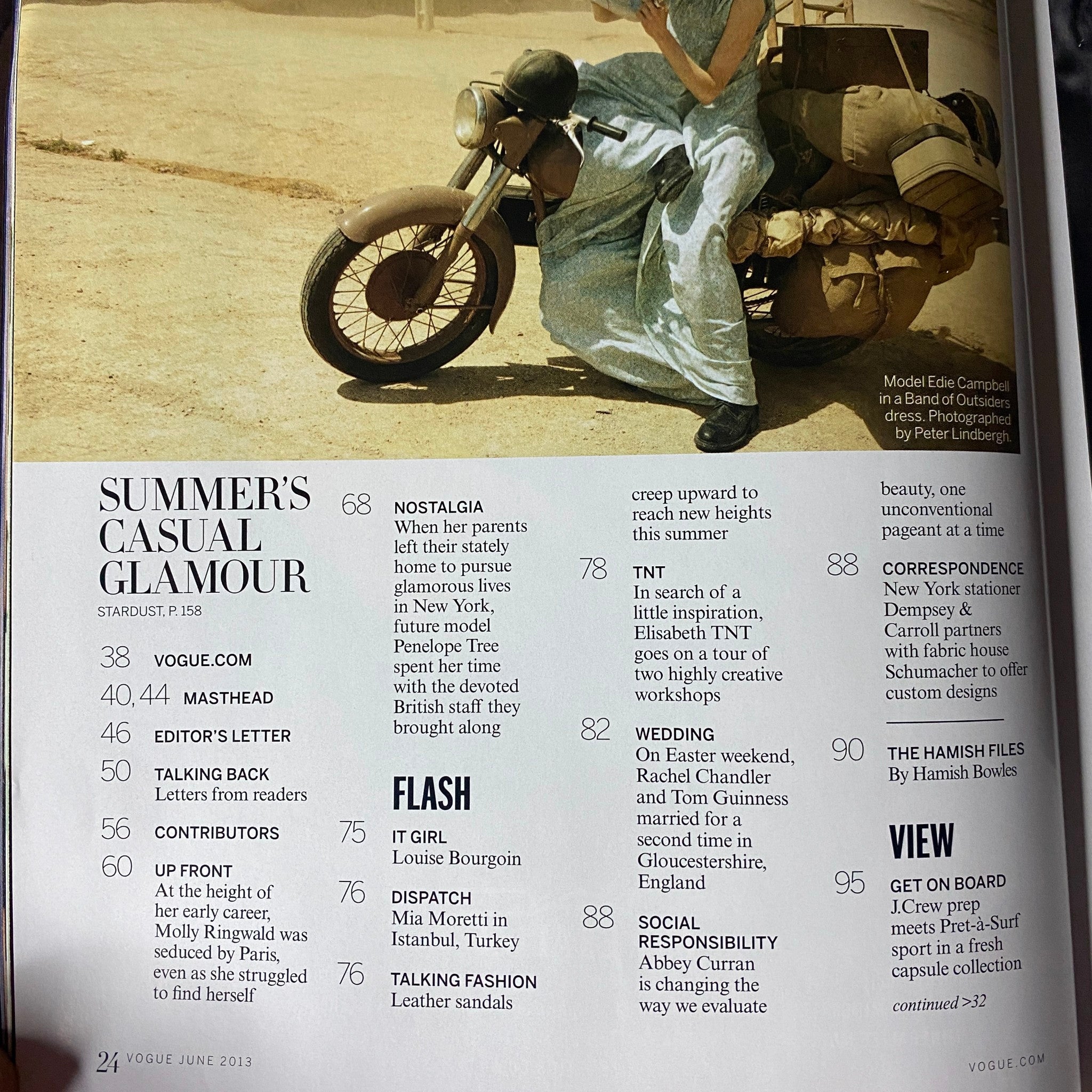 Inside Vogue Magazine June 2013 featuring a motorcycle model showcasing summer's casual glamour, reflecting the high-fashion editorials of the issue with Kate Upton on the cover.