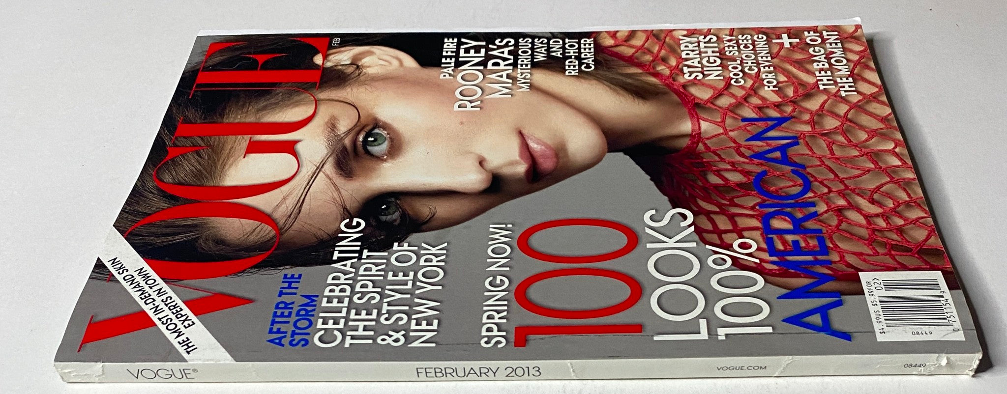 Vogue Magazine February 2013 cover with Rooney Mara, highlighting fashion themes and celebrating the spirit of New York, presented in a visually appealing design.