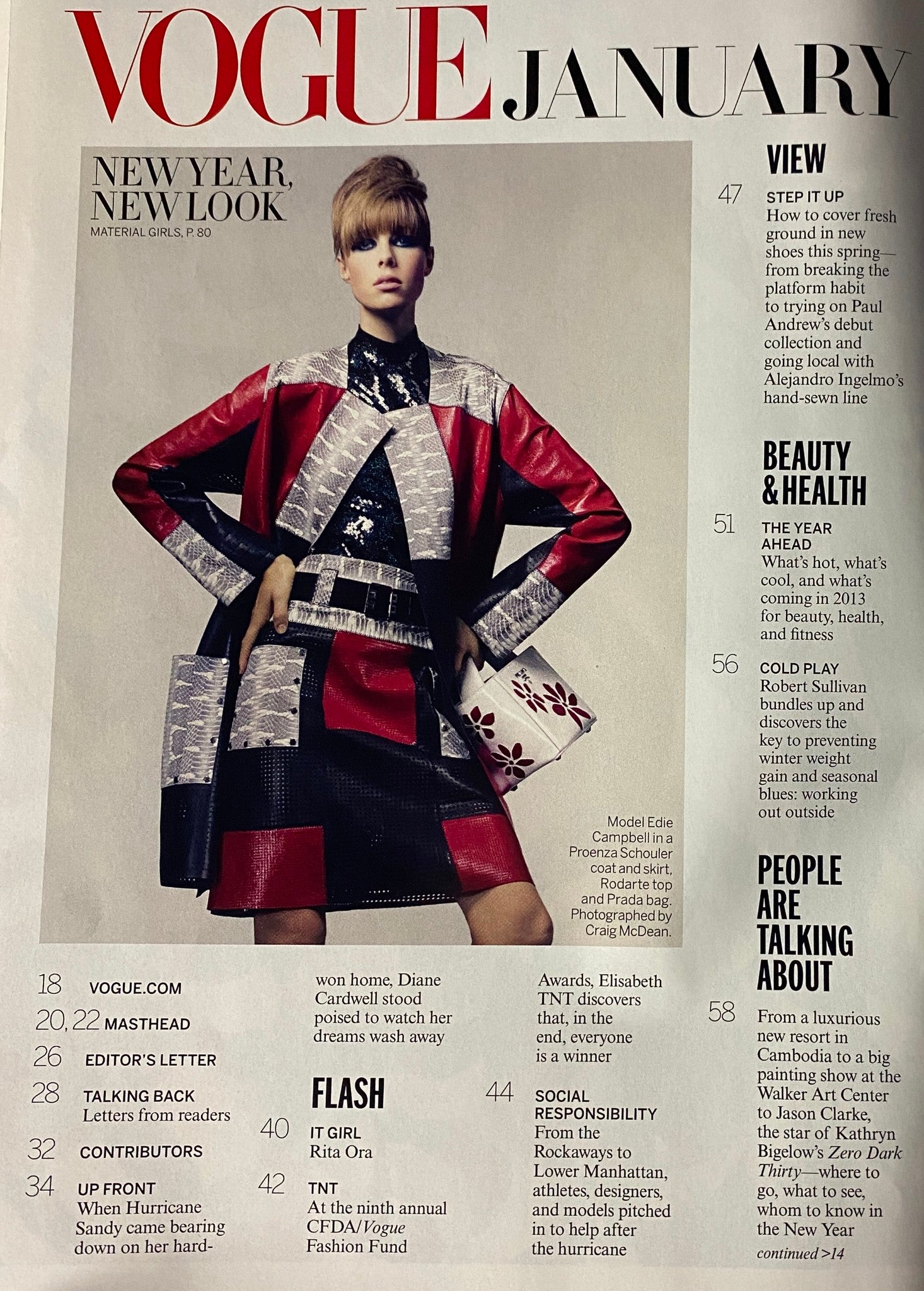 Vogue Magazine January 2013 featuring a model in a striking red and black outfit on the inside cover, showcasing bold fashion styles and editorial content.