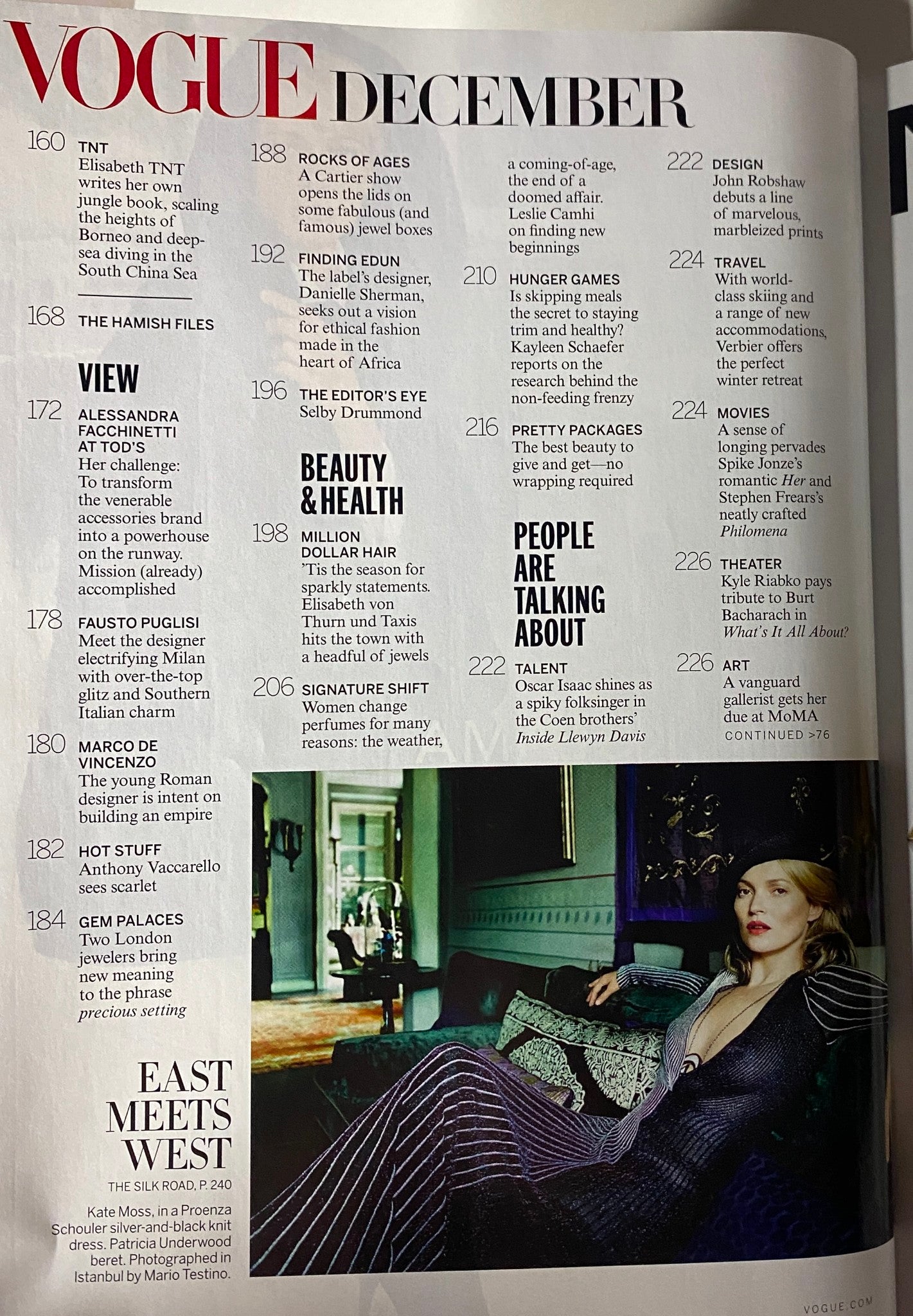 Vogue Magazine December 2013 pages showcasing articles on beauty, health, and fashion, with a spotlight on the editorial features and designer spotlights.