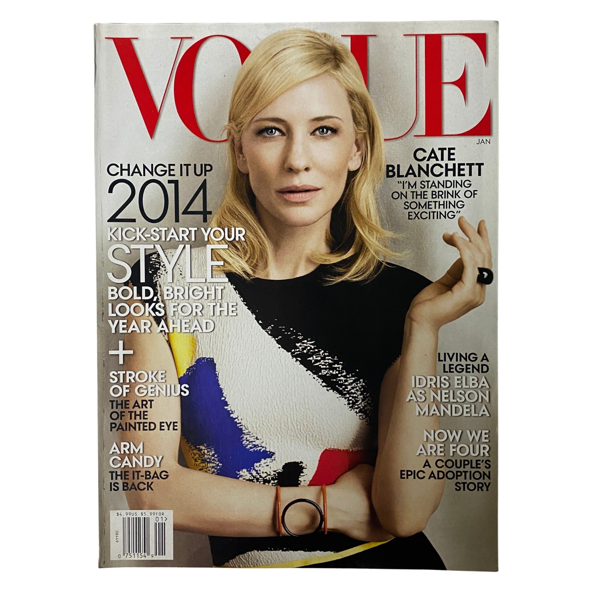 Vogue Magazine January 2014 issue featuring Cate Blanchett on the cover, highlighting her style in a colorful dress, and promoting the theme for 2014.