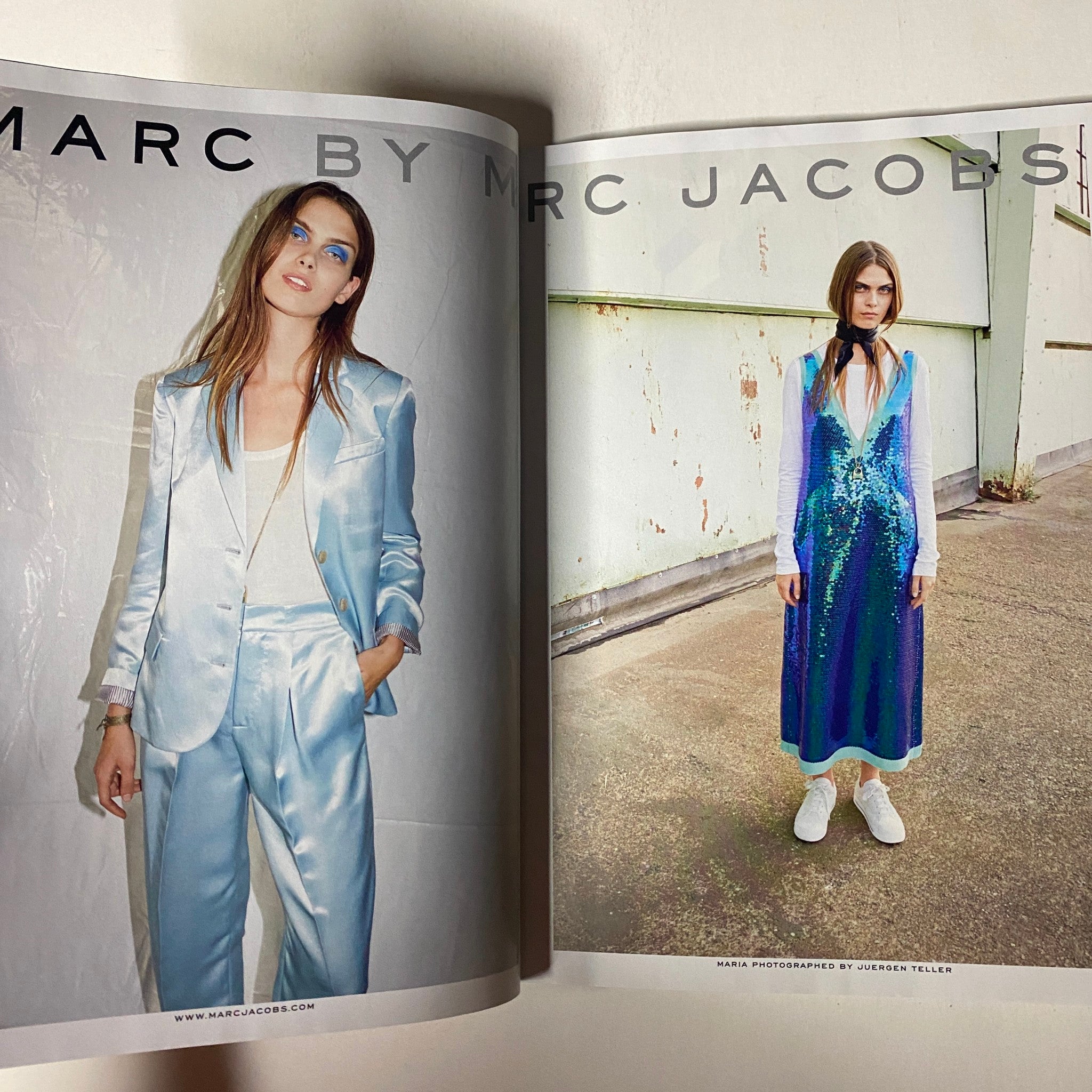 Fashion spread from Vogue Magazine January 2014, featuring a model in elegant outfits by Marc Jacobs, emphasizing contemporary styles.