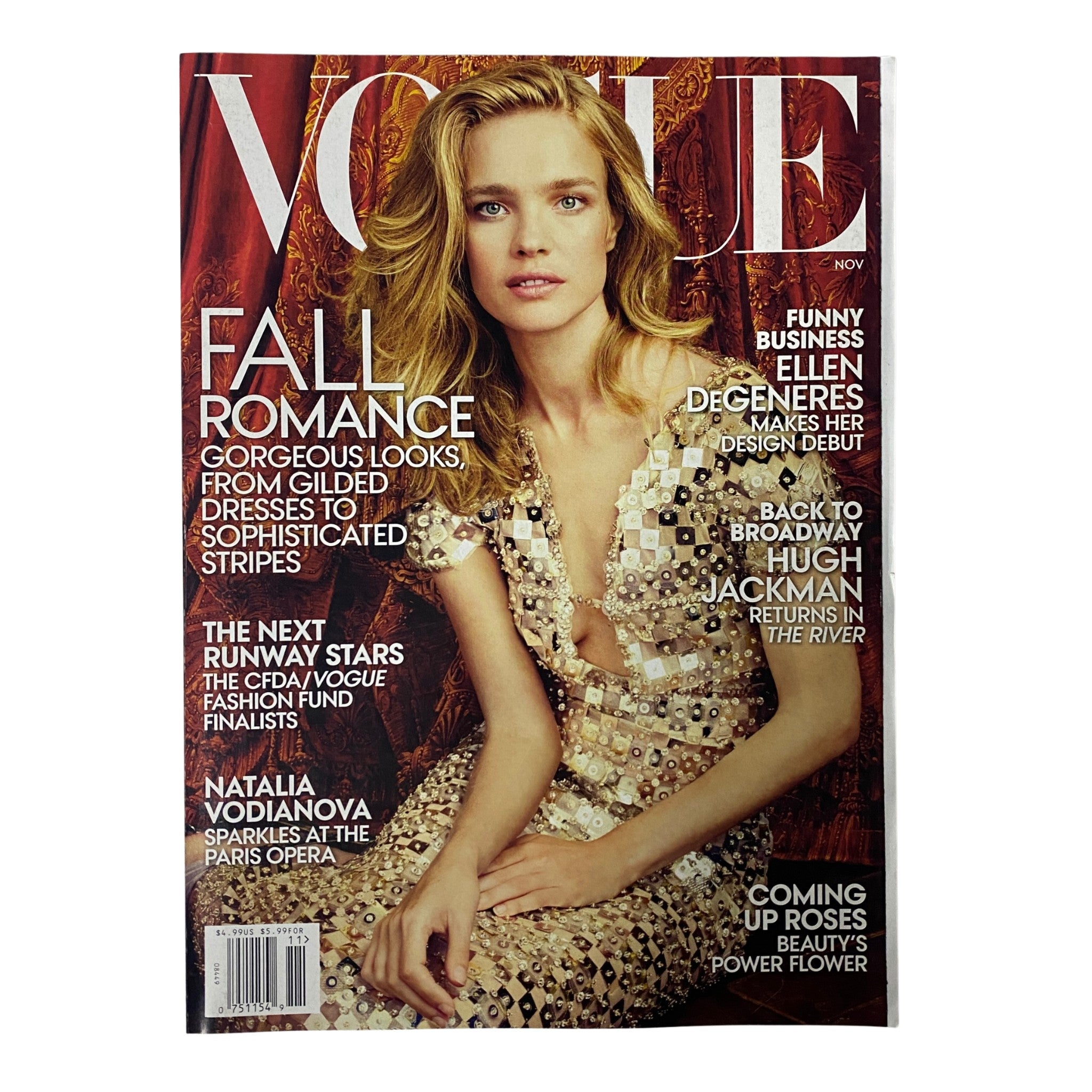 Vogue Magazine November 2014 featuring Natalia Vodianova on the cover, highlighting 'Fall Romance' fashion styles with intricate designs and elegance.