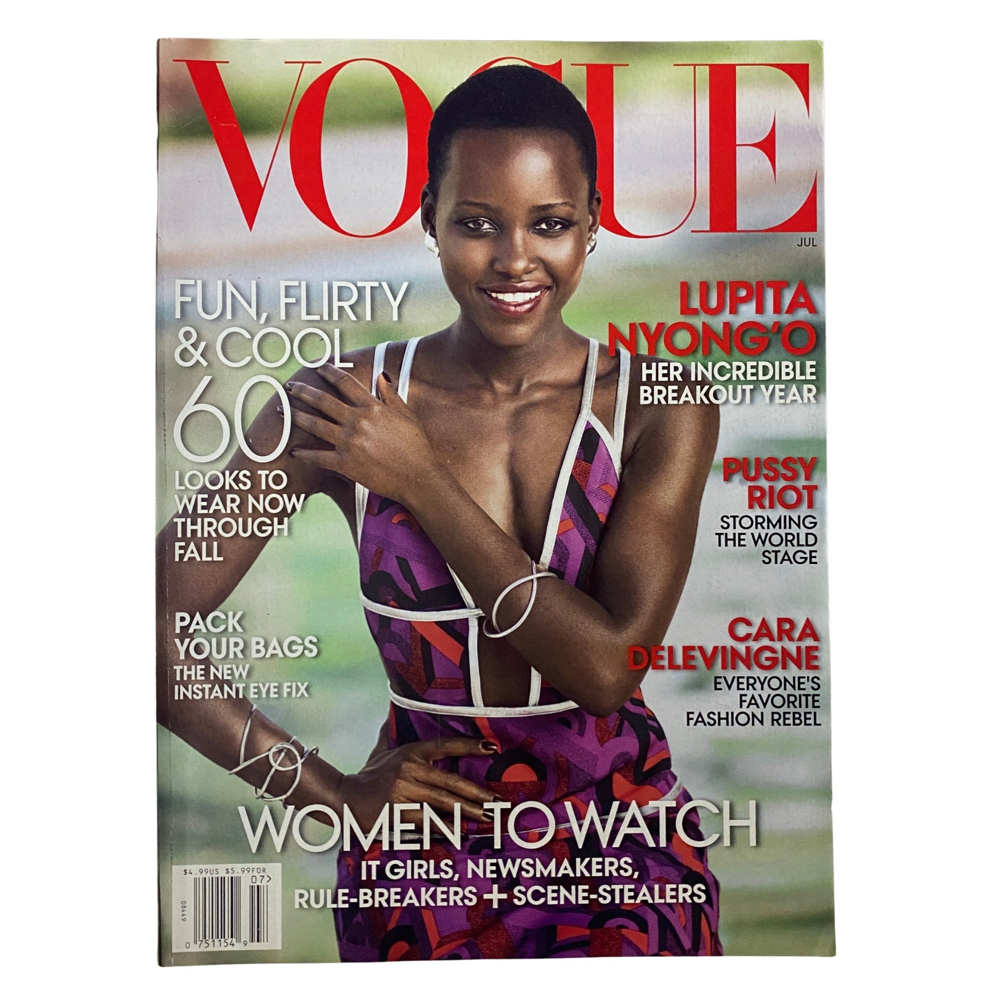 Cover of Vogue Magazine July 2014 featuring actress Lupita Nyong'o, highlighting her amazing breakout year with the tagline 'Women to Watch'. The magazine showcases vibrant fashion and cultural stories.
