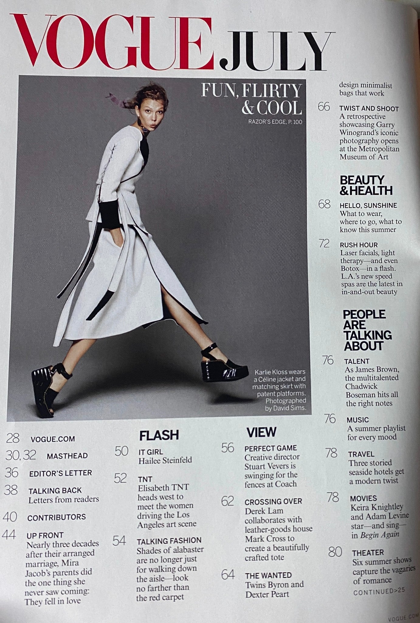 Inside page of July 2014 Vogue Magazine, featuring the table of contents with the title 'Fun, Flirty & Cool', and showcasing fashion and beauty content alongside notable features and profiles.