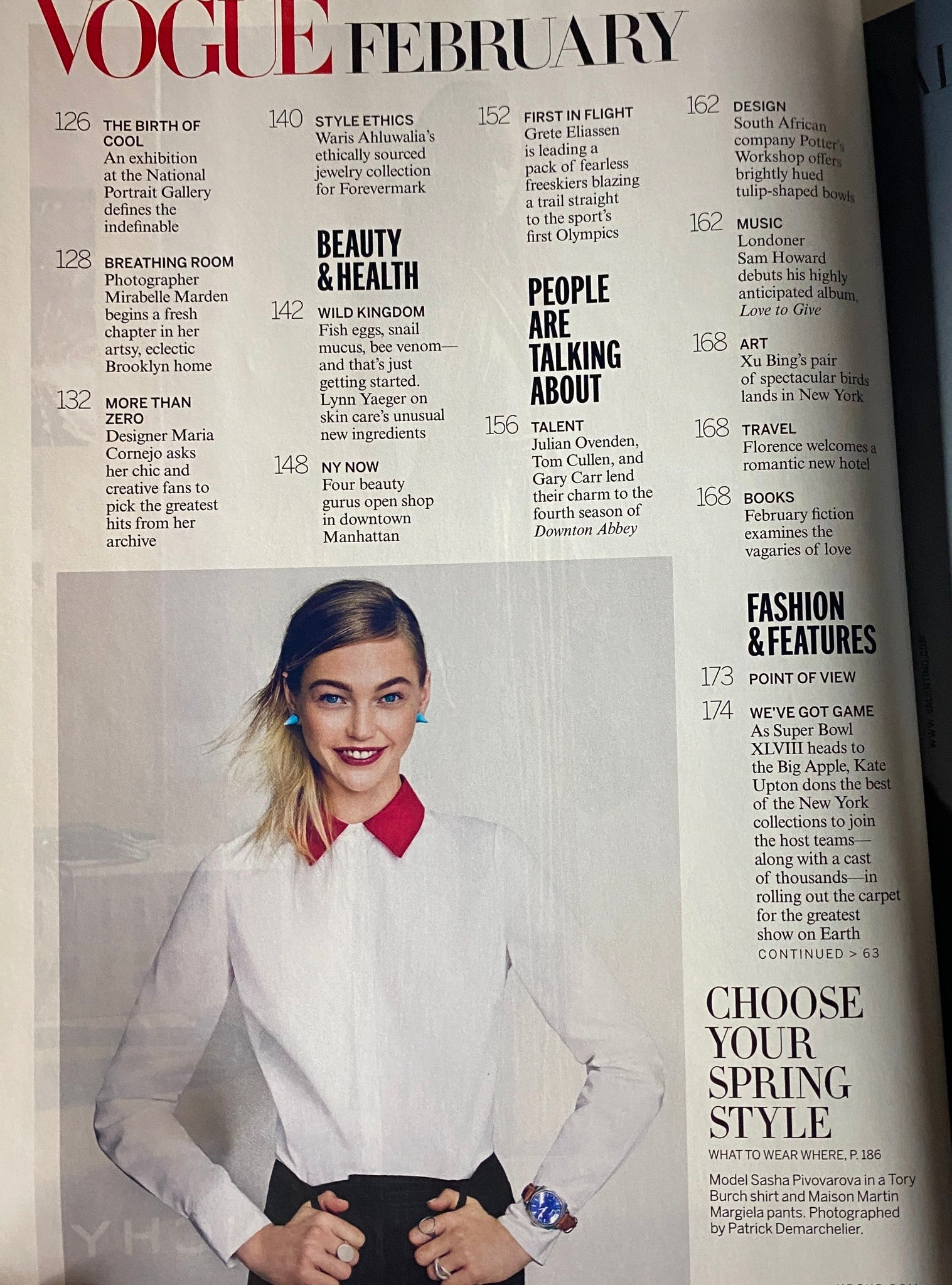 Another page from Vogue Magazine February 2014, displaying various features including spring style choices and cultural highlights.