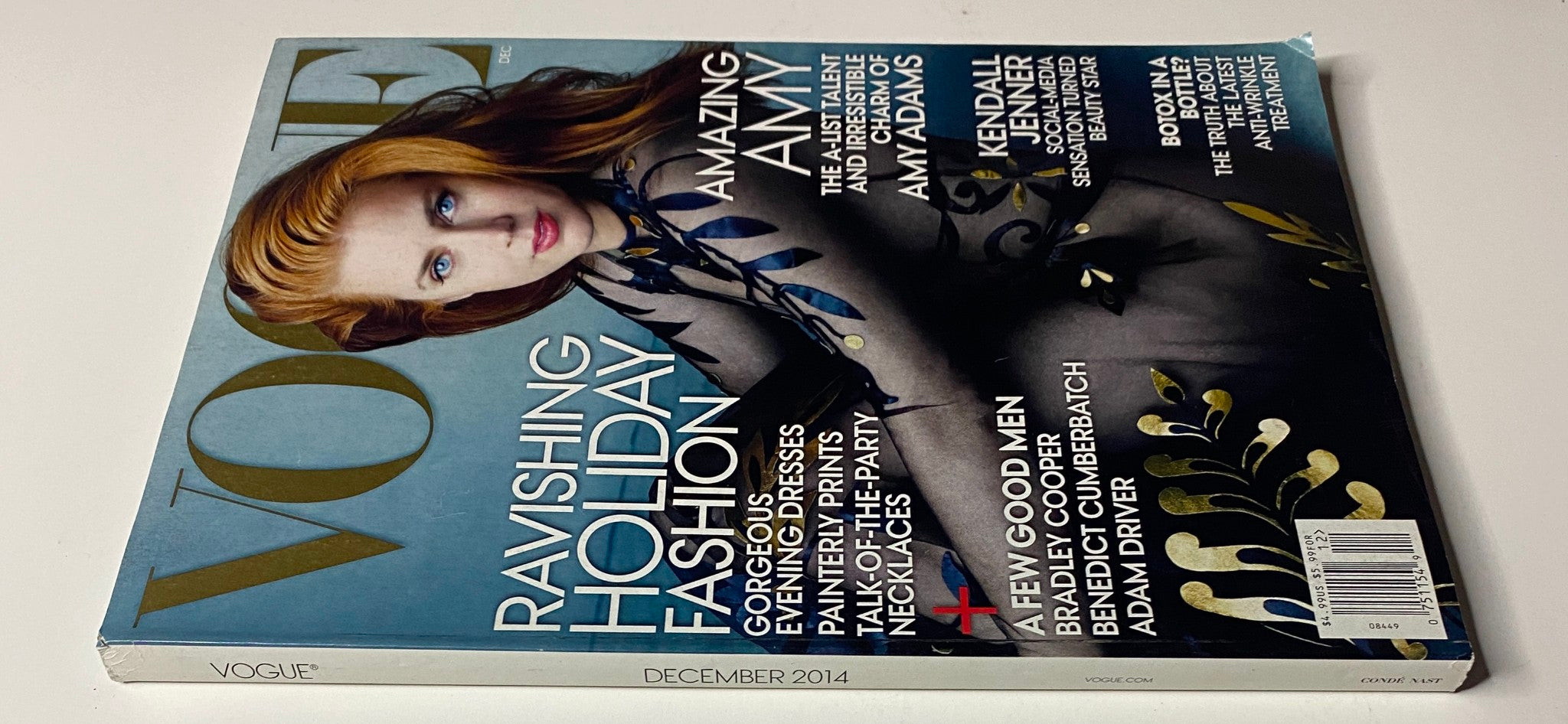 Vogue Magazine December 2014 featuring Amy Adams on the cover, showcasing a ravishing holiday theme with bold fashion aesthetics.