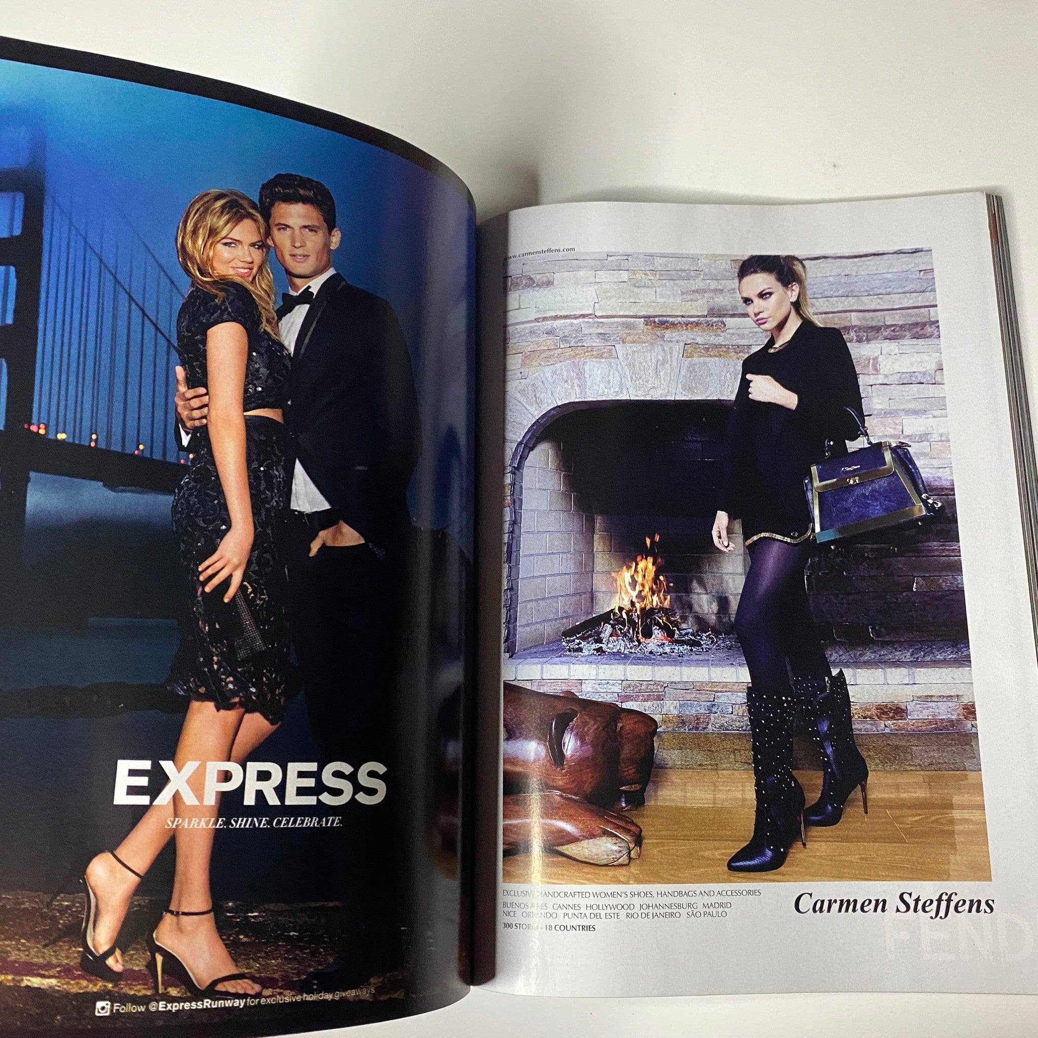 Advertisement spread in Vogue Magazine December 2014 featuring stylish models in evening wear, promoting 'Express' and 'Carmen Steffens' products.