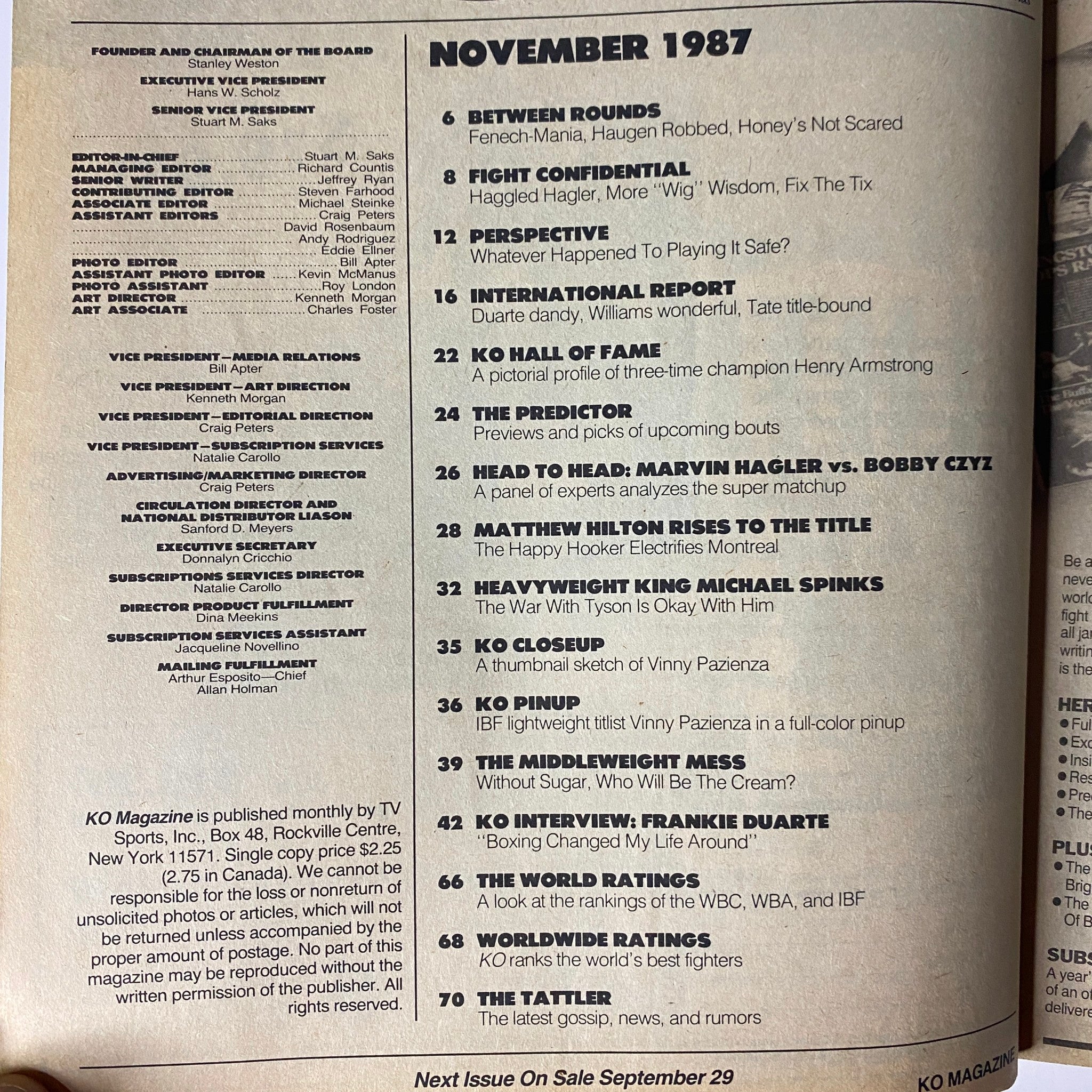 November 1987 issue of KO Boxing Magazine featuring a detailed contents page highlighting articles such as 'Between Rounds', 'Fight Confidential', and a profile of heavyweight champion Michael Spinks. This vintage magazine cover promises in-depth boxing insights and stories relevant to boxing enthusiasts.