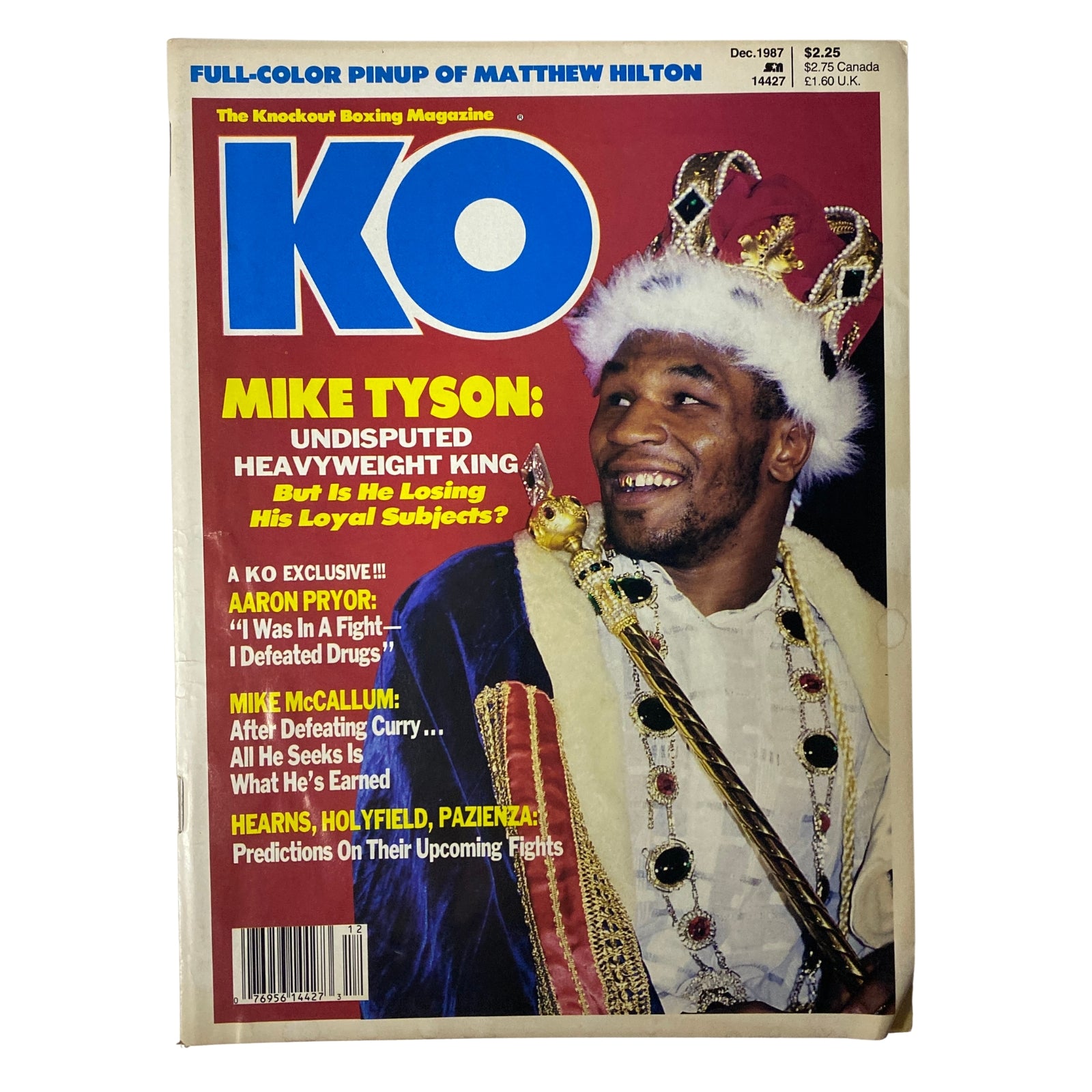 Cover of KO Boxing Magazine December 1987 featuring Mike Tyson, labeled as 'Undisputed Heavyweight King'. The cover includes highlights such as a full-color pinup of Matthew Hilton and topics of boxing exclusives.
